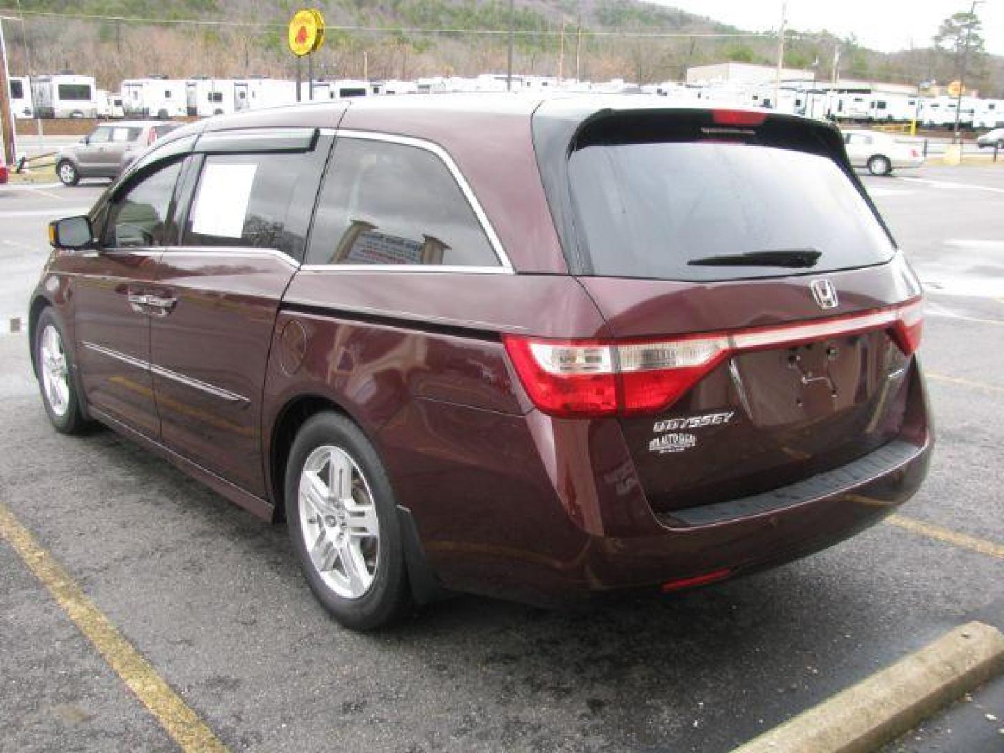 2013 Maroon Honda Odyssey Touring (5FNRL5H96DB) with an 3.5L V6 SOHC 24V engine, 5-Speed Automatic transmission, located at 2443 Albert Pike, Hot Springs, AR, 71913, (501) 623-6255, 34.492222, -93.109993 - Photo#2