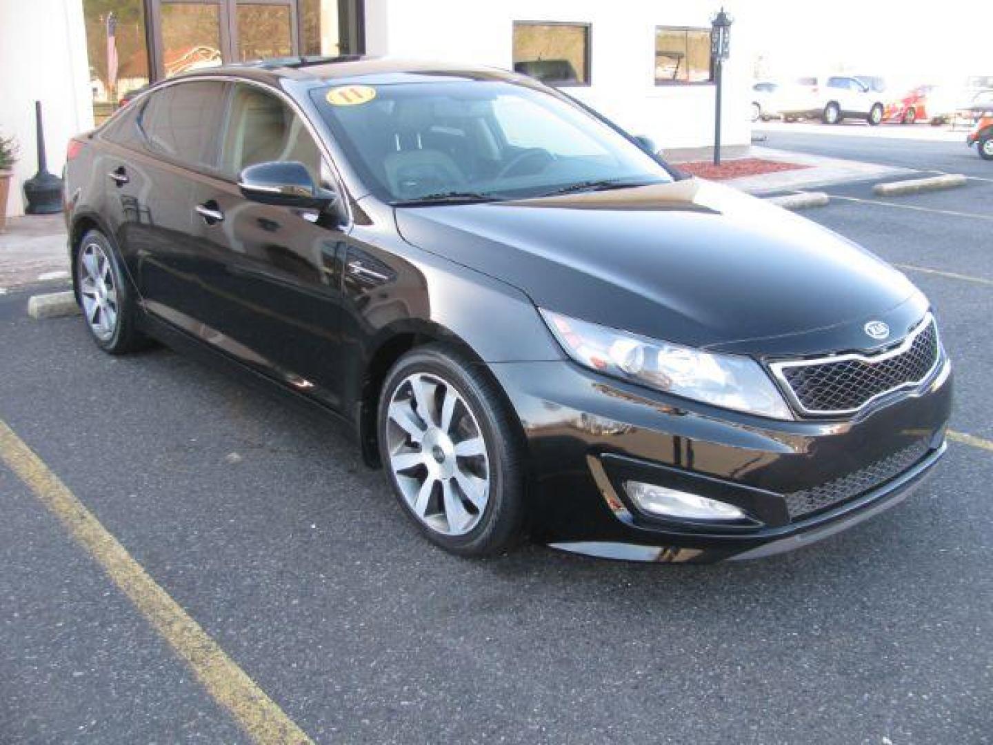 2011 Black Kia Optima SX (KNAGR4A63B5) with an 2.0L L4 DOHC 16V TURBO engine, 6-Speed Automatic transmission, located at 2443 Albert Pike, Hot Springs, AR, 71913, (501) 623-6255, 34.492222, -93.109993 - LISTED FEATURES MAY BE OPTIONAL AND NOT INCLUDED ON THIS VEHICLE!!! - Photo#0