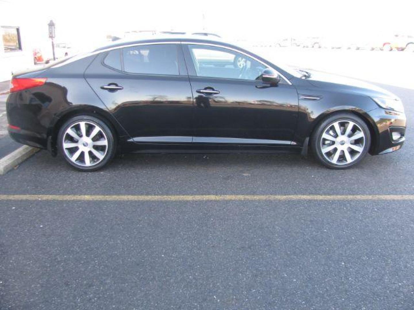 2011 Black Kia Optima SX (KNAGR4A63B5) with an 2.0L L4 DOHC 16V TURBO engine, 6-Speed Automatic transmission, located at 2443 Albert Pike, Hot Springs, AR, 71913, (501) 623-6255, 34.492222, -93.109993 - LISTED FEATURES MAY BE OPTIONAL AND NOT INCLUDED ON THIS VEHICLE!!! - Photo#1