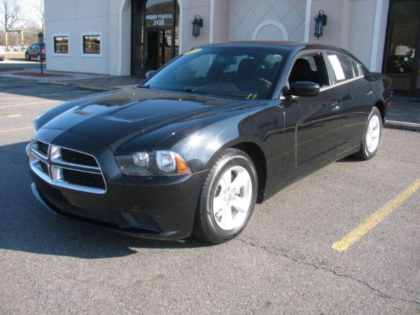 2013 Black Dodge Charger SE (2C3CDXBG9DH) with an 3.6L V6 DOHC 24V engine, 5-Speed Automatic transmission, located at 2443 Albert Pike, Hot Springs, AR, 71913, (501) 623-6255, 34.492222, -93.109993 - Photo#0