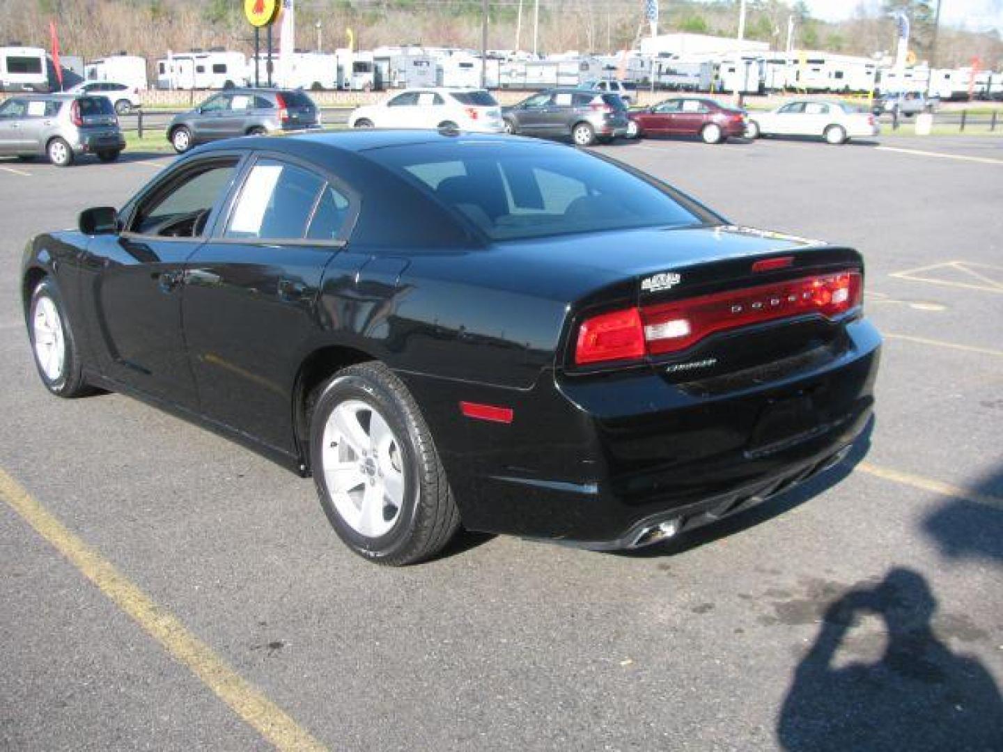 2013 Black Dodge Charger SE (2C3CDXBG9DH) with an 3.6L V6 DOHC 24V engine, 5-Speed Automatic transmission, located at 2443 Albert Pike, Hot Springs, AR, 71913, (501) 623-6255, 34.492222, -93.109993 - Photo#2