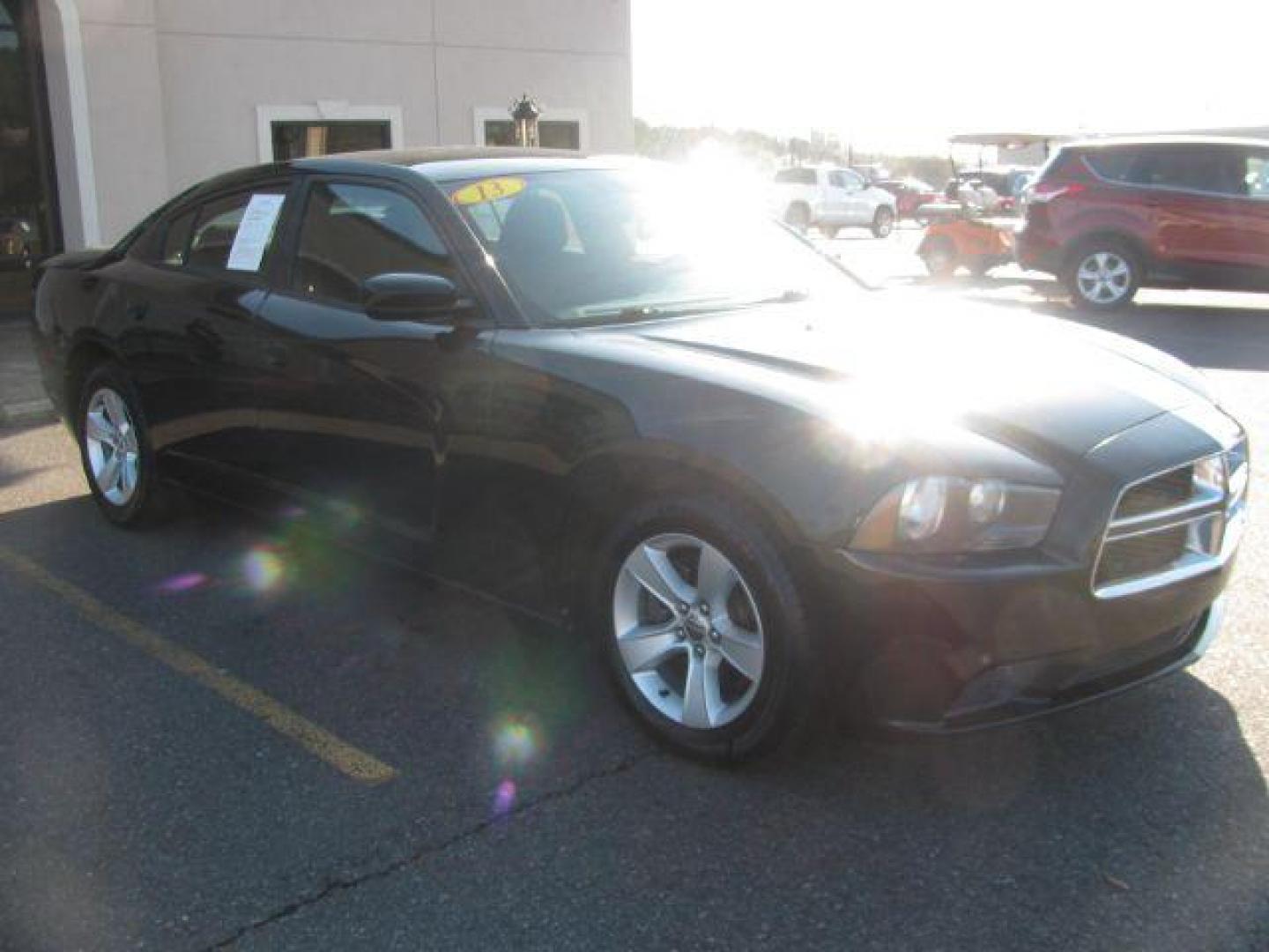 2013 Black Dodge Charger SE (2C3CDXBG9DH) with an 3.6L V6 DOHC 24V engine, 5-Speed Automatic transmission, located at 2443 Albert Pike, Hot Springs, AR, 71913, (501) 623-6255, 34.492222, -93.109993 - Photo#5