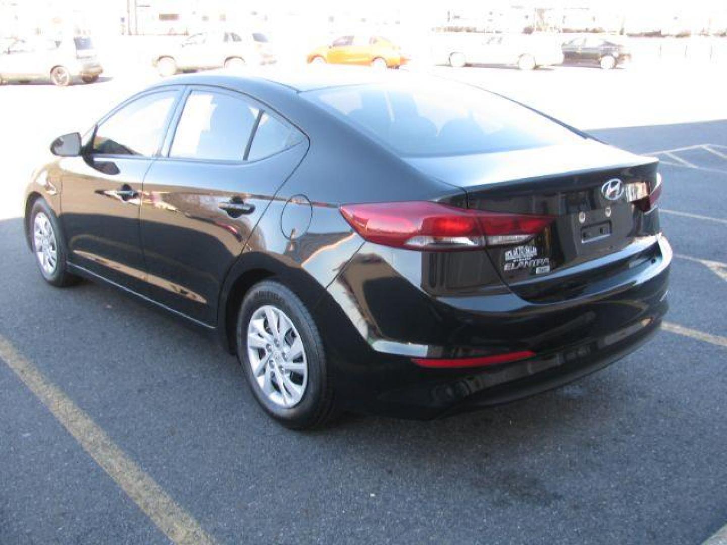 2018 Black Hyundai Elantra SE 6AT (5NPD74LF0JH) with an 1.8L L4 DOHC 16V engine, 6-Speed Automatic transmission, located at 2443 Albert Pike, Hot Springs, AR, 71913, (501) 623-6255, 34.492222, -93.109993 - All listed features may not be available!!!! - Photo#2