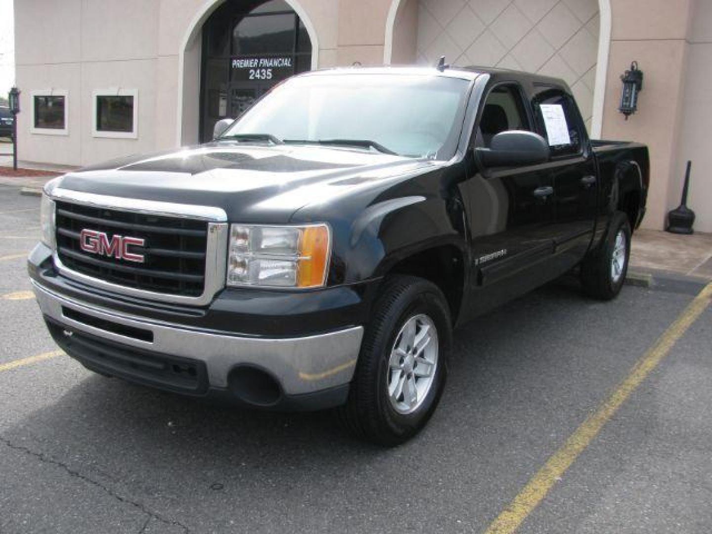 2009 Black GMC Sierra 1500 SL Crew Cab 2WD (3GTEC13C49G) with an 4.8L V8 OHV 16V engine, 4-Speed Automatic transmission, located at 2443 Albert Pike, Hot Springs, AR, 71913, (501) 623-6255, 34.492222, -93.109993 - Photo#0