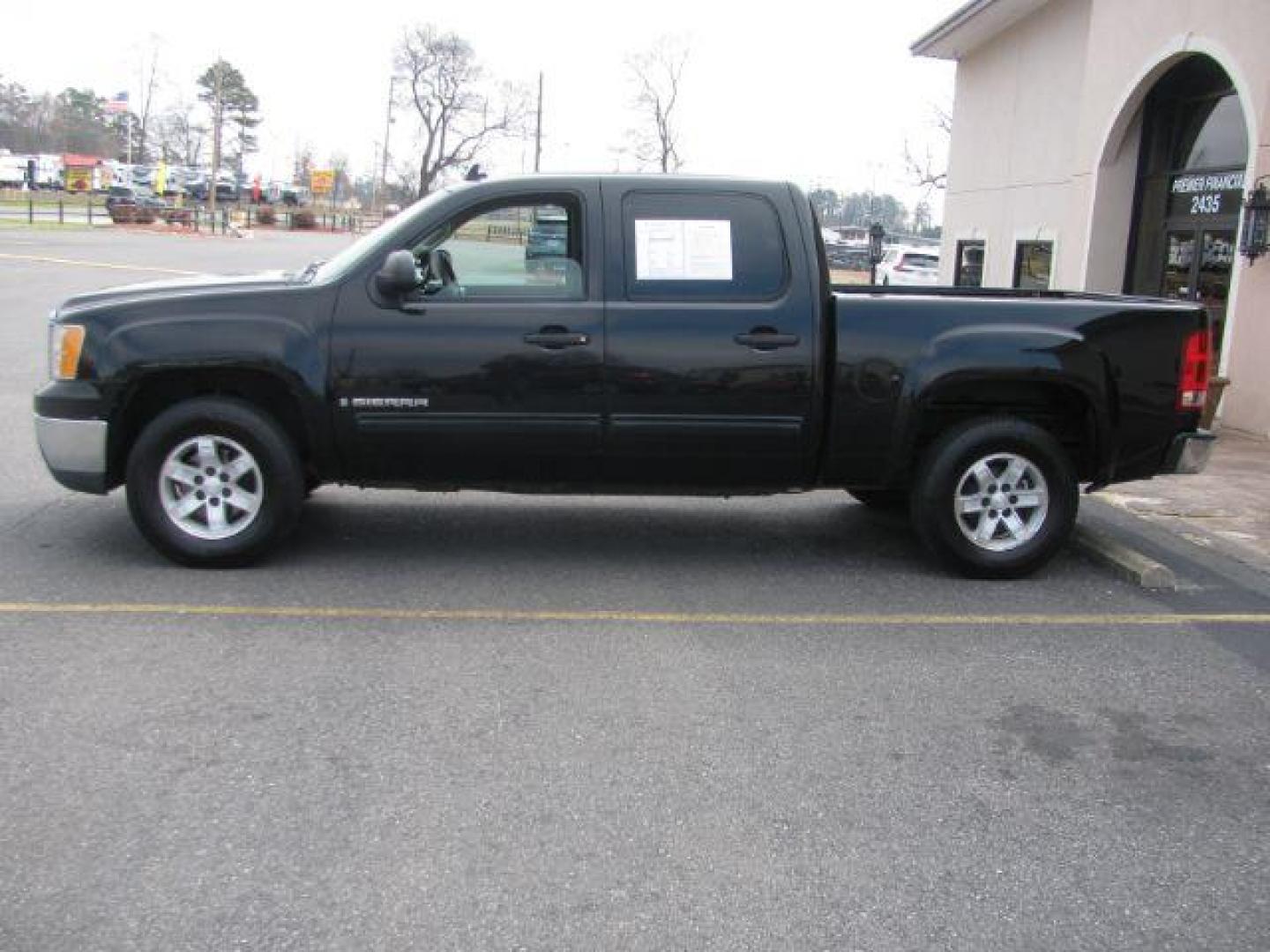 2009 Black GMC Sierra 1500 SL Crew Cab 2WD (3GTEC13C49G) with an 4.8L V8 OHV 16V engine, 4-Speed Automatic transmission, located at 2443 Albert Pike, Hot Springs, AR, 71913, (501) 623-6255, 34.492222, -93.109993 - Photo#1