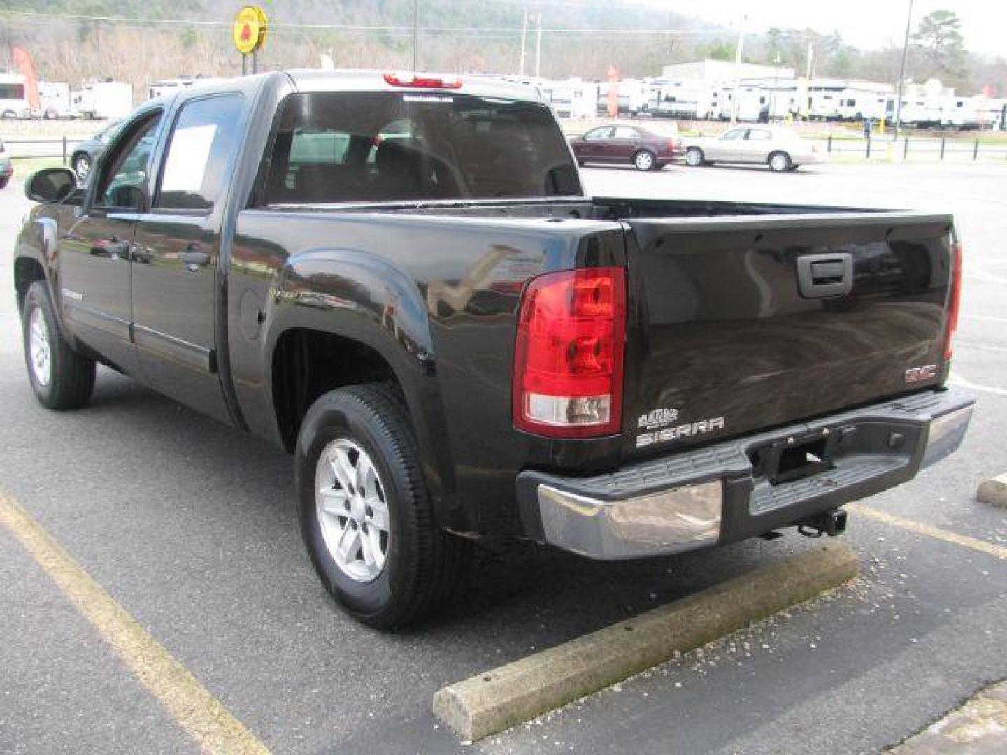 2009 Black GMC Sierra 1500 SL Crew Cab 2WD (3GTEC13C49G) with an 4.8L V8 OHV 16V engine, 4-Speed Automatic transmission, located at 2443 Albert Pike, Hot Springs, AR, 71913, (501) 623-6255, 34.492222, -93.109993 - Photo#2