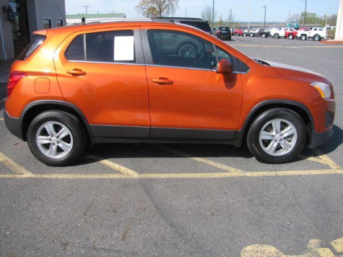 2015 Orange Chevrolet Trax LT FWD (KL7CJLSBXFB) with an 1.4L L4 DOHC 16V engine, 6-Speed Automatic transmission, located at 2443 Albert Pike, Hot Springs, AR, 71913, (501) 623-6255, 34.492222, -93.109993 - Photo#1