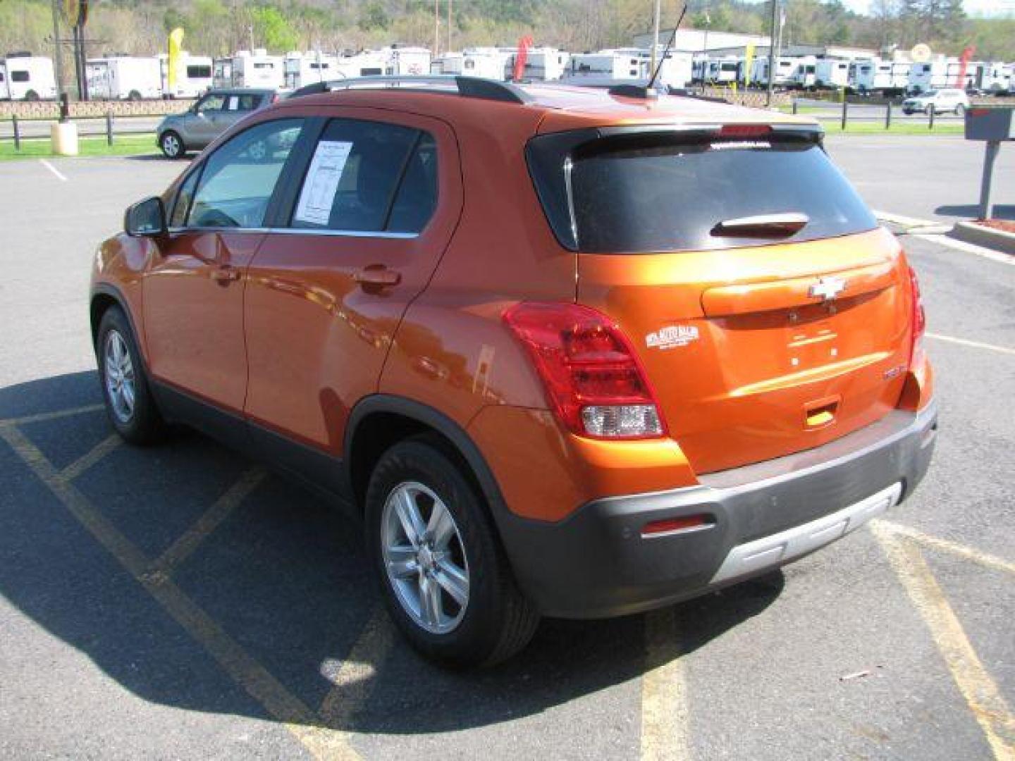 2015 Orange Chevrolet Trax LT FWD (KL7CJLSBXFB) with an 1.4L L4 DOHC 16V engine, 6-Speed Automatic transmission, located at 2443 Albert Pike, Hot Springs, AR, 71913, (501) 623-6255, 34.492222, -93.109993 - Photo#3