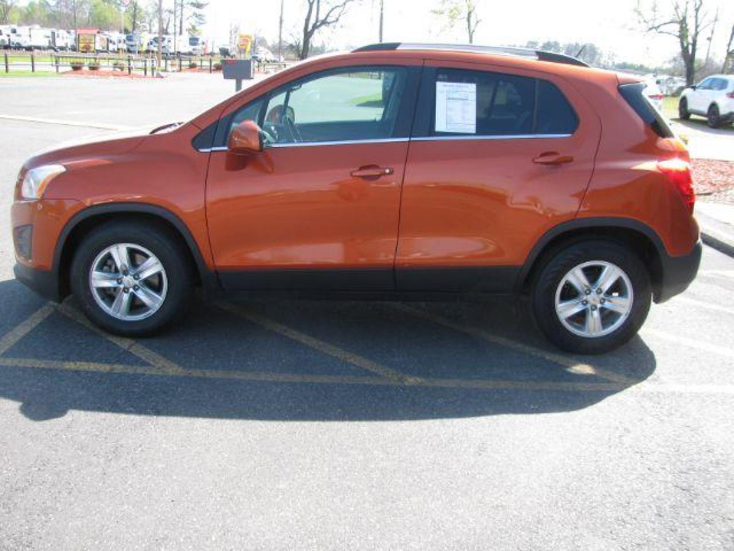 2015 Orange Chevrolet Trax LT FWD (KL7CJLSBXFB) with an 1.4L L4 DOHC 16V engine, 6-Speed Automatic transmission, located at 2443 Albert Pike, Hot Springs, AR, 71913, (501) 623-6255, 34.492222, -93.109993 - Photo#4