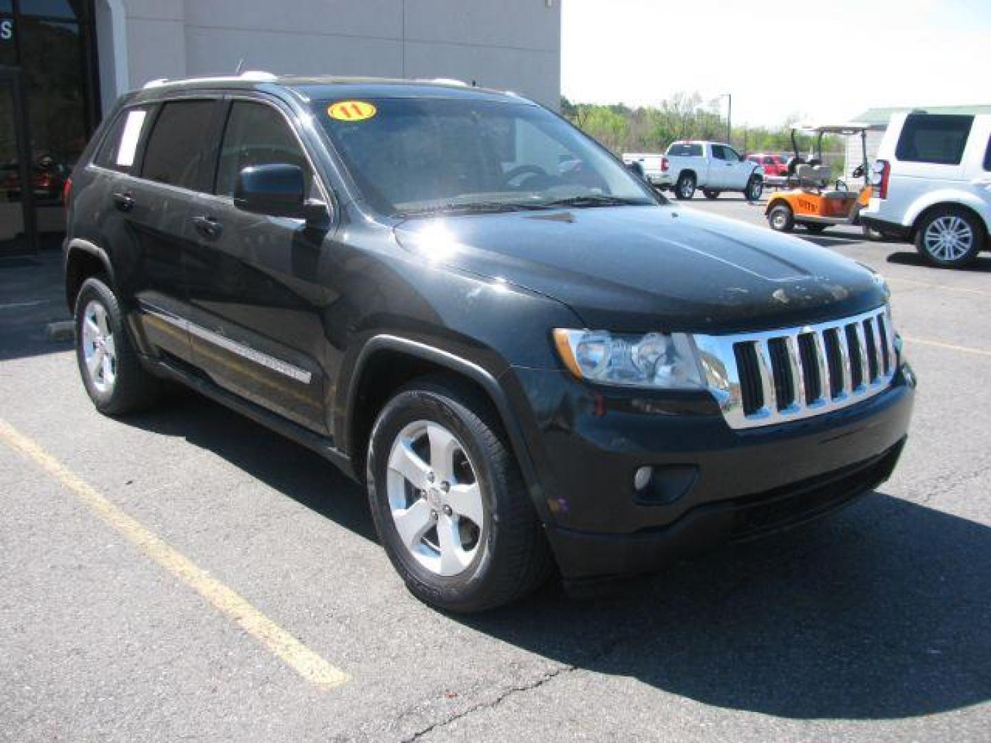 2011 Black Jeep Grand Cherokee Laredo 2WD (1J4RS4GG4BC) with an 3.6L V6 DOHC 24V engine, 5-Speed Automatic transmission, located at 2443 Albert Pike, Hot Springs, AR, 71913, (501) 623-6255, 34.492222, -93.109993 - LISTED FEATURES MAY BE OPTIONAL AND NOT INCLUDED ON THIS VEHICLE!!! - Photo#0