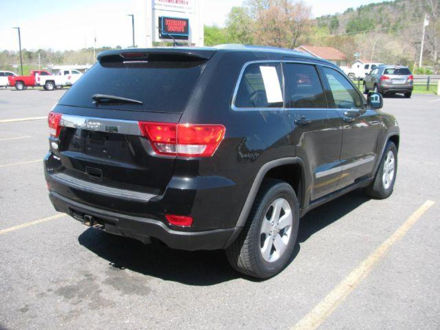 2011 Black Jeep Grand Cherokee Laredo 2WD (1J4RS4GG4BC) with an 3.6L V6 DOHC 24V engine, 5-Speed Automatic transmission, located at 2443 Albert Pike, Hot Springs, AR, 71913, (501) 623-6255, 34.492222, -93.109993 - LISTED FEATURES MAY BE OPTIONAL AND NOT INCLUDED ON THIS VEHICLE!!! - Photo#2