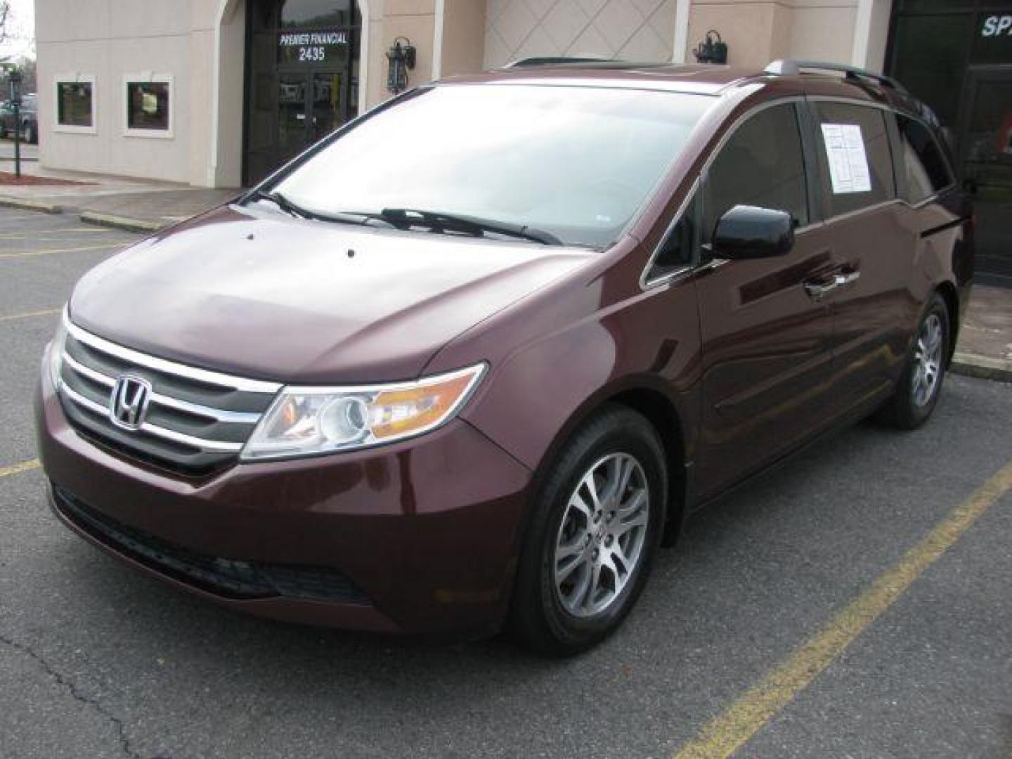 2012 Maroon Honda Odyssey EX-L (5FNRL5H63CB) with an 3.5L V6 SOHC 24V engine, 5-Speed Automatic transmission, located at 2443 Albert Pike, Hot Springs, AR, 71913, (501) 623-6255, 34.492222, -93.109993 - Photo#0