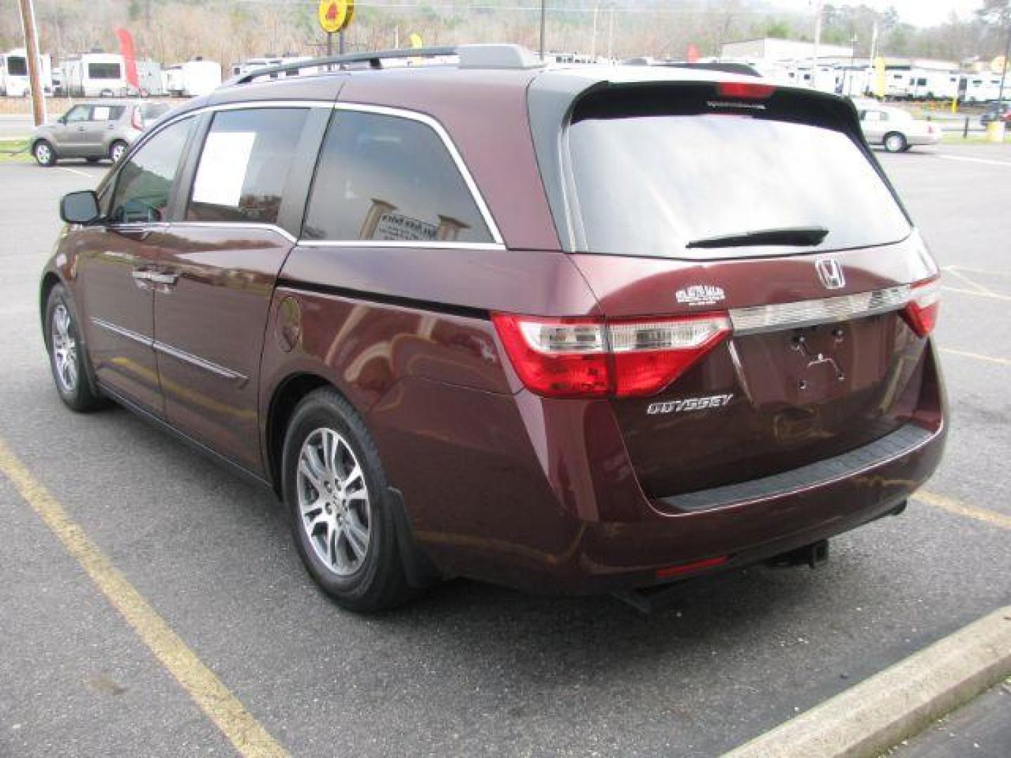 2012 Maroon Honda Odyssey EX-L (5FNRL5H63CB) with an 3.5L V6 SOHC 24V engine, 5-Speed Automatic transmission, located at 2443 Albert Pike, Hot Springs, AR, 71913, (501) 623-6255, 34.492222, -93.109993 - Photo#2