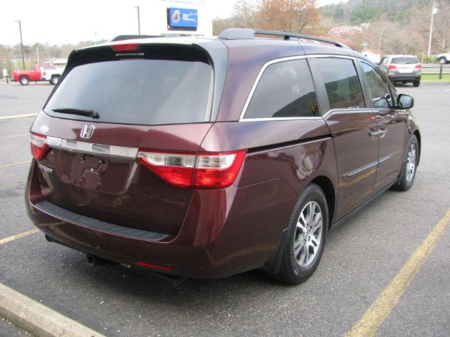 2012 Maroon Honda Odyssey EX-L (5FNRL5H63CB) with an 3.5L V6 SOHC 24V engine, 5-Speed Automatic transmission, located at 2443 Albert Pike, Hot Springs, AR, 71913, (501) 623-6255, 34.492222, -93.109993 - Photo#3