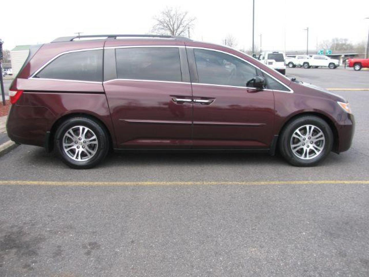 2012 Maroon Honda Odyssey EX-L (5FNRL5H63CB) with an 3.5L V6 SOHC 24V engine, 5-Speed Automatic transmission, located at 2443 Albert Pike, Hot Springs, AR, 71913, (501) 623-6255, 34.492222, -93.109993 - Photo#4