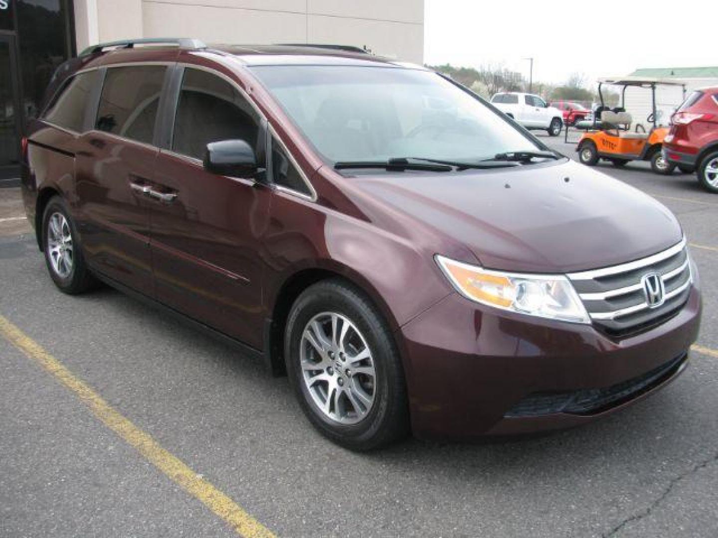 2012 Maroon Honda Odyssey EX-L (5FNRL5H63CB) with an 3.5L V6 SOHC 24V engine, 5-Speed Automatic transmission, located at 2443 Albert Pike, Hot Springs, AR, 71913, (501) 623-6255, 34.492222, -93.109993 - Photo#5