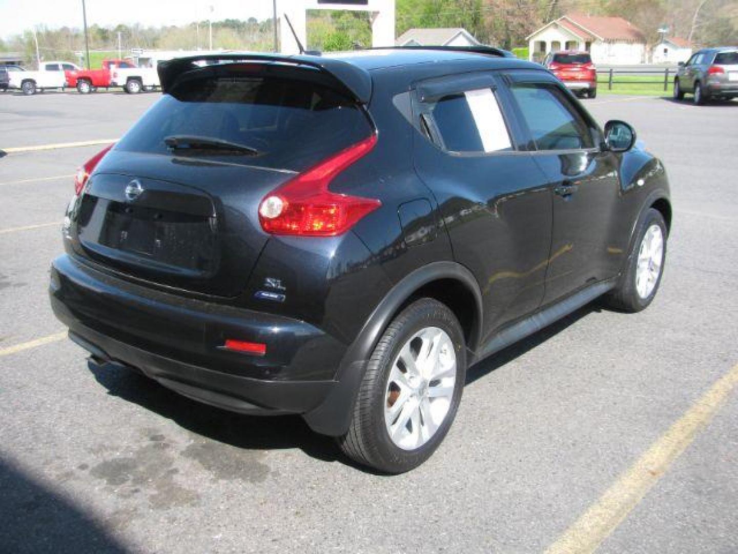 2014 Black Nissan Juke SL FWD (JN8AF5MR9ET) with an 1.6L L4 DOHC 16V engine, Continuously Variable Transmission transmission, located at 2443 Albert Pike, Hot Springs, AR, 71913, (501) 623-6255, 34.492222, -93.109993 - Photo#2