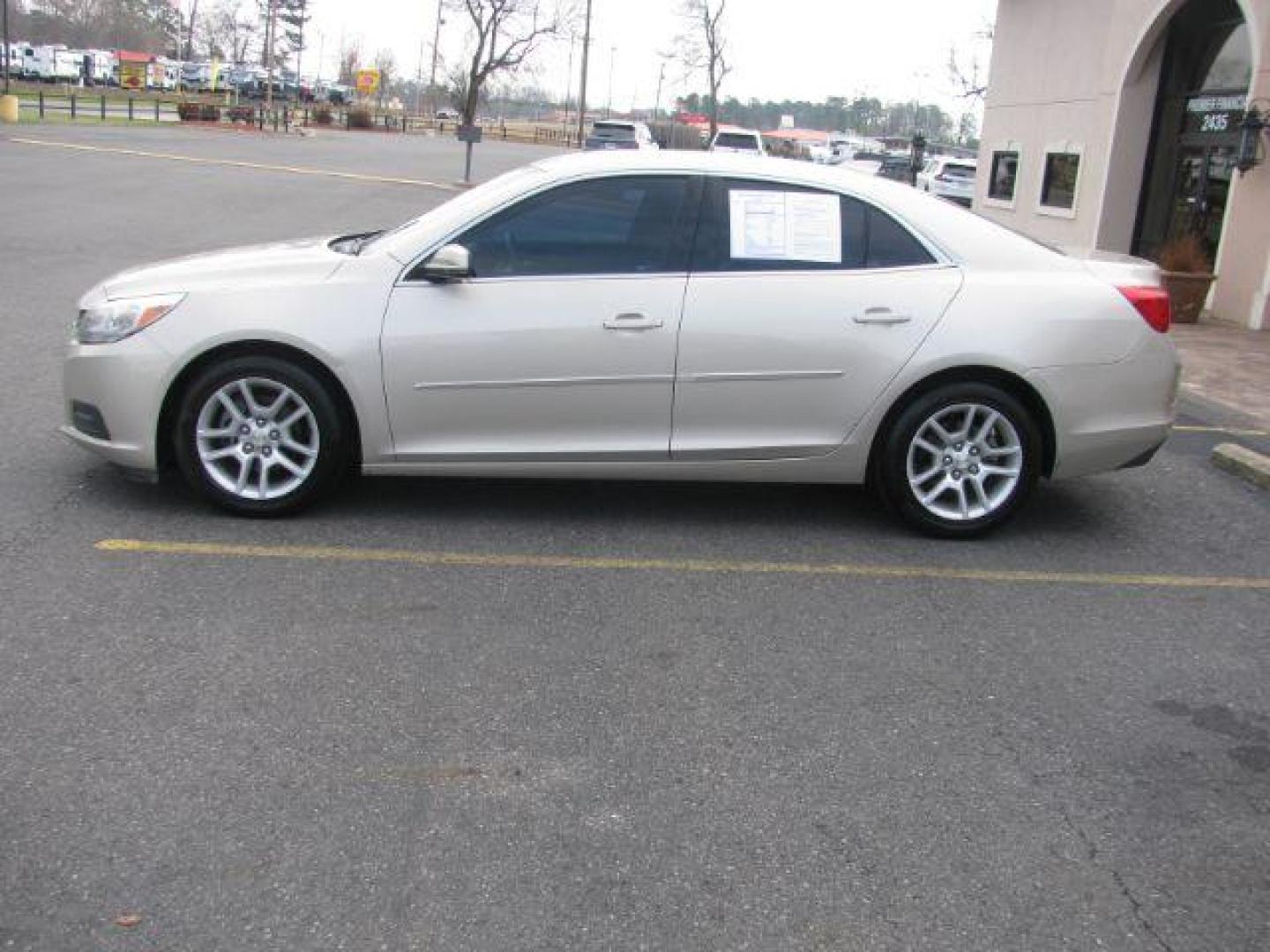 2015 Tan Chevrolet Malibu 1LT (1G11C5SL3FF) with an 2.5L L4 DOHC 16V engine, 6-Speed Automatic transmission, located at 2443 Albert Pike, Hot Springs, AR, 71913, (501) 623-6255, 34.492222, -93.109993 - Photo#1