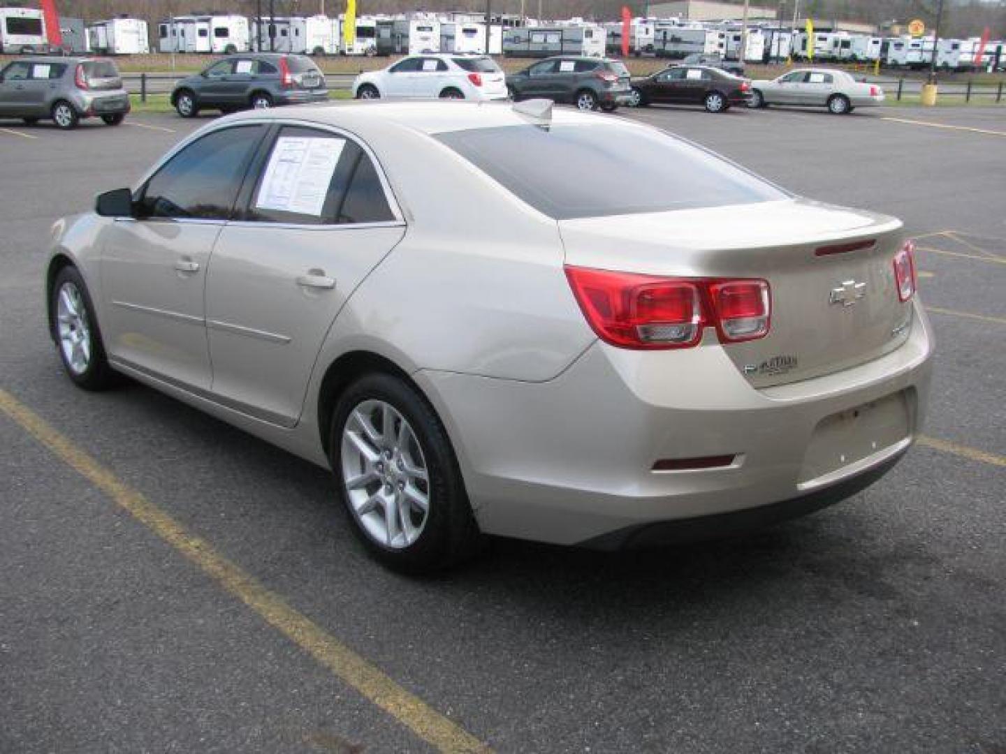 2015 Tan Chevrolet Malibu 1LT (1G11C5SL3FF) with an 2.5L L4 DOHC 16V engine, 6-Speed Automatic transmission, located at 2443 Albert Pike, Hot Springs, AR, 71913, (501) 623-6255, 34.492222, -93.109993 - Photo#2