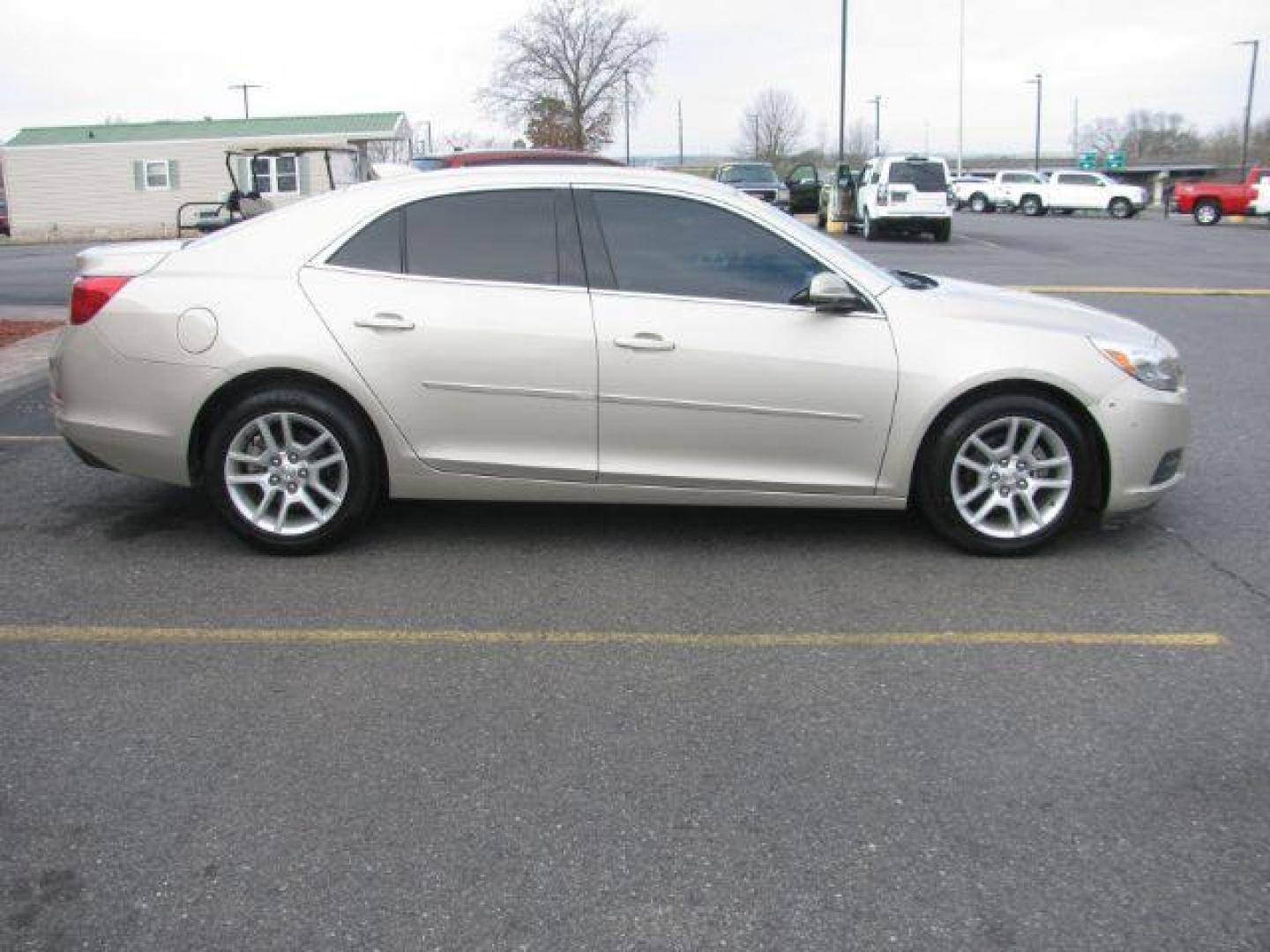 2015 Tan Chevrolet Malibu 1LT (1G11C5SL3FF) with an 2.5L L4 DOHC 16V engine, 6-Speed Automatic transmission, located at 2443 Albert Pike, Hot Springs, AR, 71913, (501) 623-6255, 34.492222, -93.109993 - Photo#4