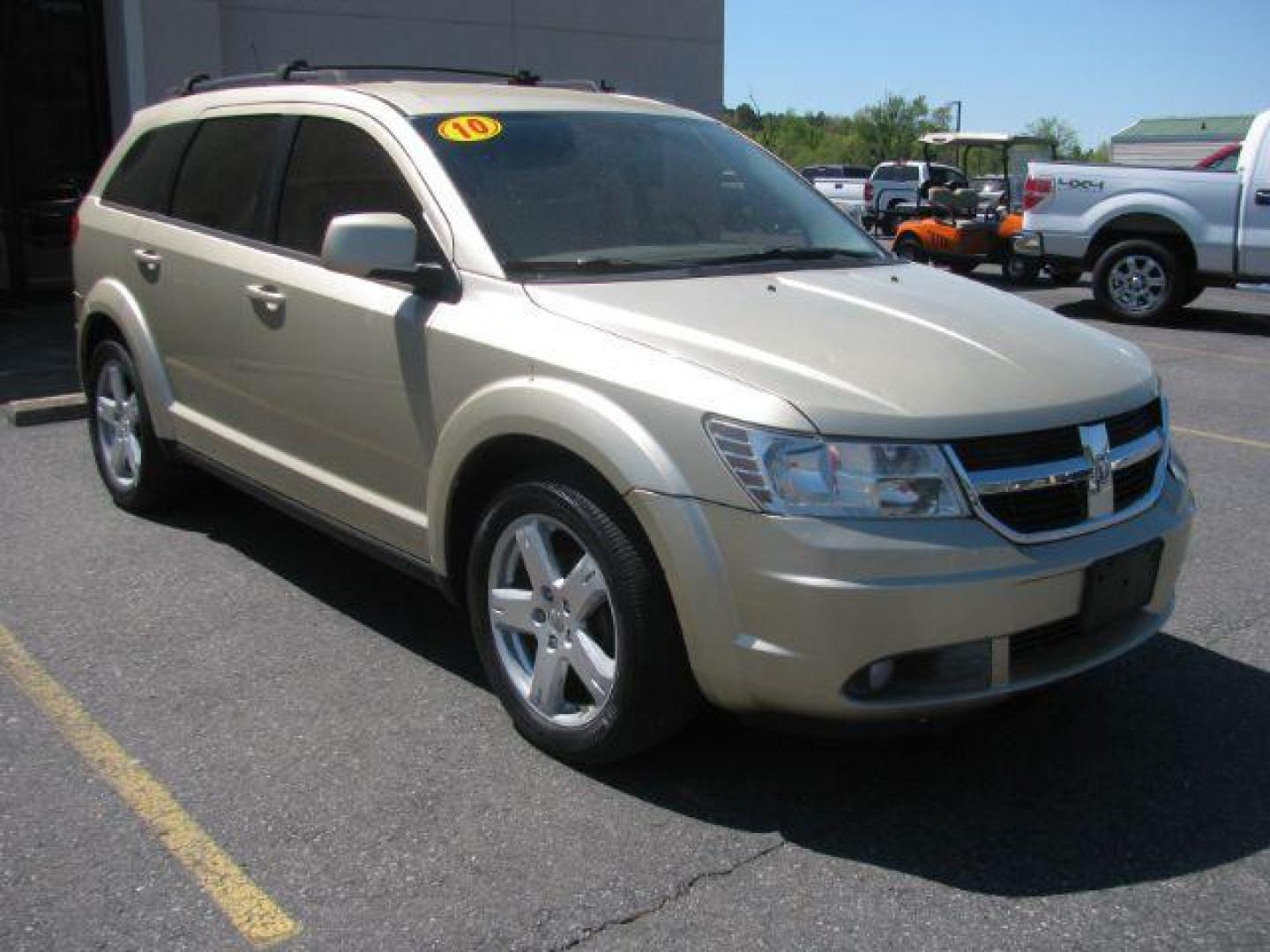 2010 Gold Dodge Journey SXT (3D4PG5FV3AT) with an 3.5L V6 SOHC 24V engine, 6-Speed Automatic transmission, located at 2443 Albert Pike, Hot Springs, AR, 71913, (501) 623-6255, 34.492222, -93.109993 - ALL LISTED FEATURES MAY NOT BE AVAILABLE!!!!! - Photo#0