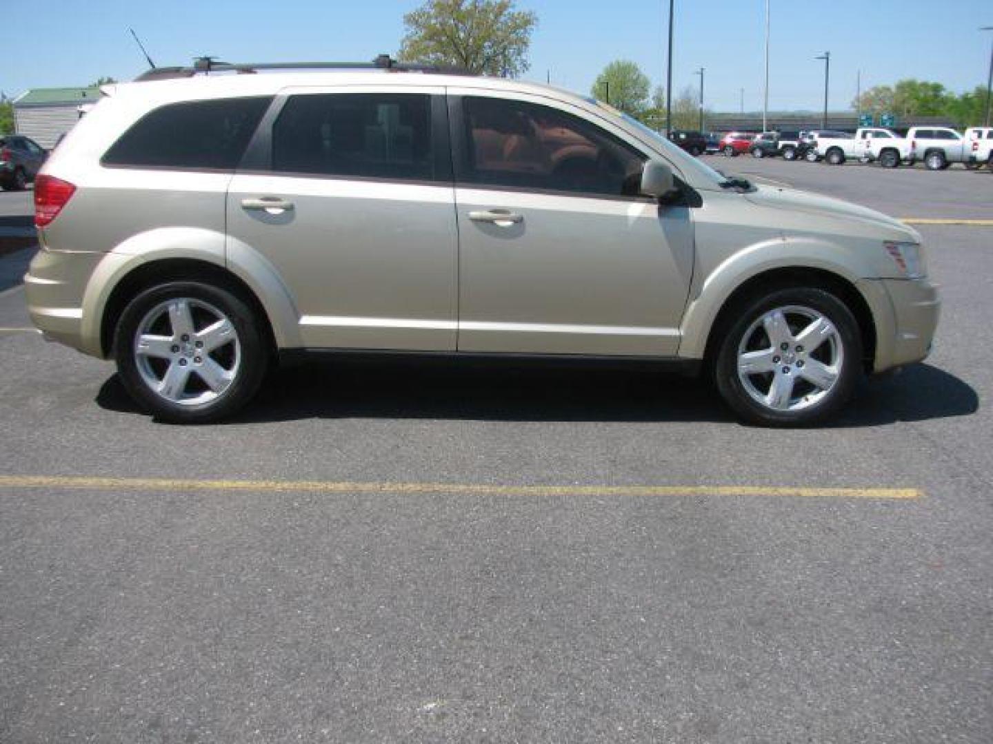 2010 Gold Dodge Journey SXT (3D4PG5FV3AT) with an 3.5L V6 SOHC 24V engine, 6-Speed Automatic transmission, located at 2443 Albert Pike, Hot Springs, AR, 71913, (501) 623-6255, 34.492222, -93.109993 - ALL LISTED FEATURES MAY NOT BE AVAILABLE!!!!! - Photo#1