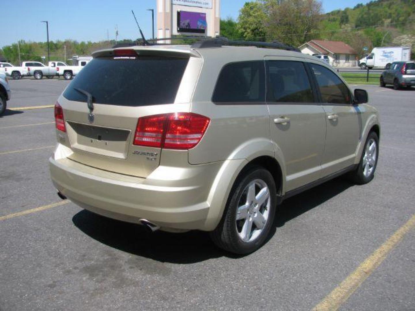 2010 Gold Dodge Journey SXT (3D4PG5FV3AT) with an 3.5L V6 SOHC 24V engine, 6-Speed Automatic transmission, located at 2443 Albert Pike, Hot Springs, AR, 71913, (501) 623-6255, 34.492222, -93.109993 - ALL LISTED FEATURES MAY NOT BE AVAILABLE!!!!! - Photo#2