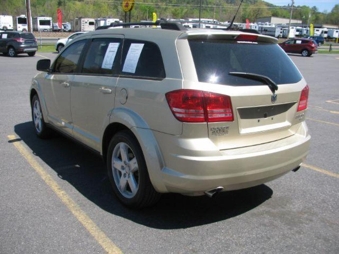 2010 Gold Dodge Journey SXT (3D4PG5FV3AT) with an 3.5L V6 SOHC 24V engine, 6-Speed Automatic transmission, located at 2443 Albert Pike, Hot Springs, AR, 71913, (501) 623-6255, 34.492222, -93.109993 - ALL LISTED FEATURES MAY NOT BE AVAILABLE!!!!! - Photo#3