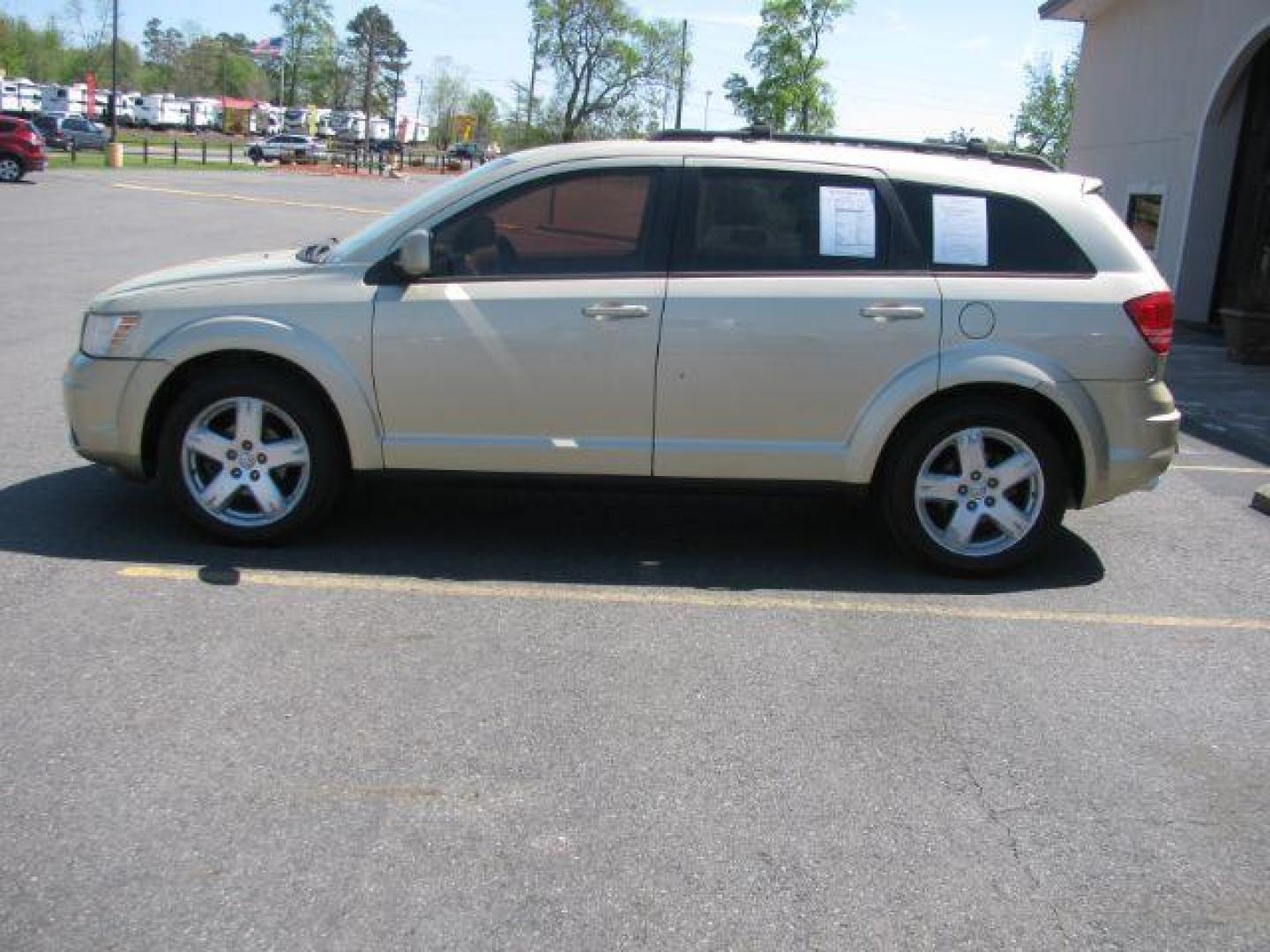 2010 Gold Dodge Journey SXT (3D4PG5FV3AT) with an 3.5L V6 SOHC 24V engine, 6-Speed Automatic transmission, located at 2443 Albert Pike, Hot Springs, AR, 71913, (501) 623-6255, 34.492222, -93.109993 - ALL LISTED FEATURES MAY NOT BE AVAILABLE!!!!! - Photo#4