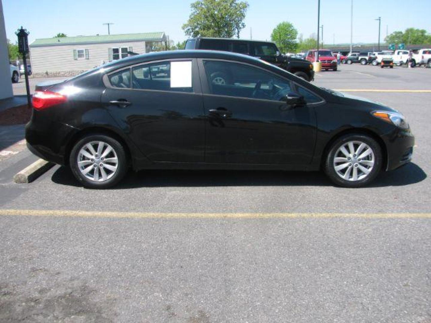 2014 Black Kia Forte EX (KNAFX4A67E5) with an 1.8L L4 DOHC 16V engine, 6-Speed Automatic transmission, located at 2443 Albert Pike, Hot Springs, AR, 71913, (501) 623-6255, 34.492222, -93.109993 - Photo#1