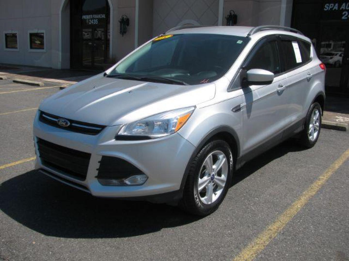 2015 Silver Ford Escape SE FWD (1FMCU0GX2FU) with an 1.6L L4 DOHC 16V engine, 6-Speed Automatic transmission, located at 2443 Albert Pike, Hot Springs, AR, 71913, (501) 623-6255, 34.492222, -93.109993 - Photo#0