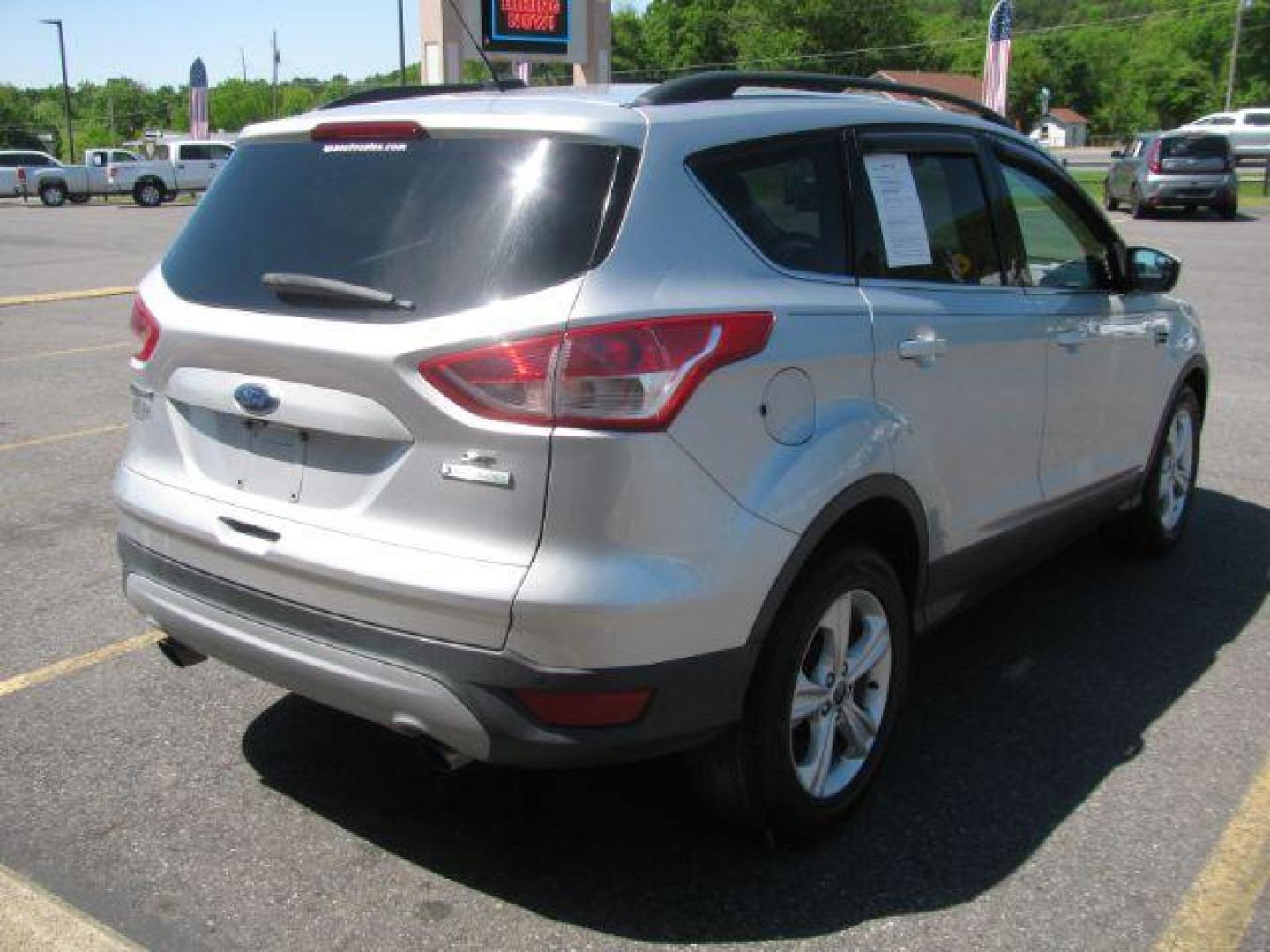 2015 Silver Ford Escape SE FWD (1FMCU0GX2FU) with an 1.6L L4 DOHC 16V engine, 6-Speed Automatic transmission, located at 2443 Albert Pike, Hot Springs, AR, 71913, (501) 623-6255, 34.492222, -93.109993 - Photo#3