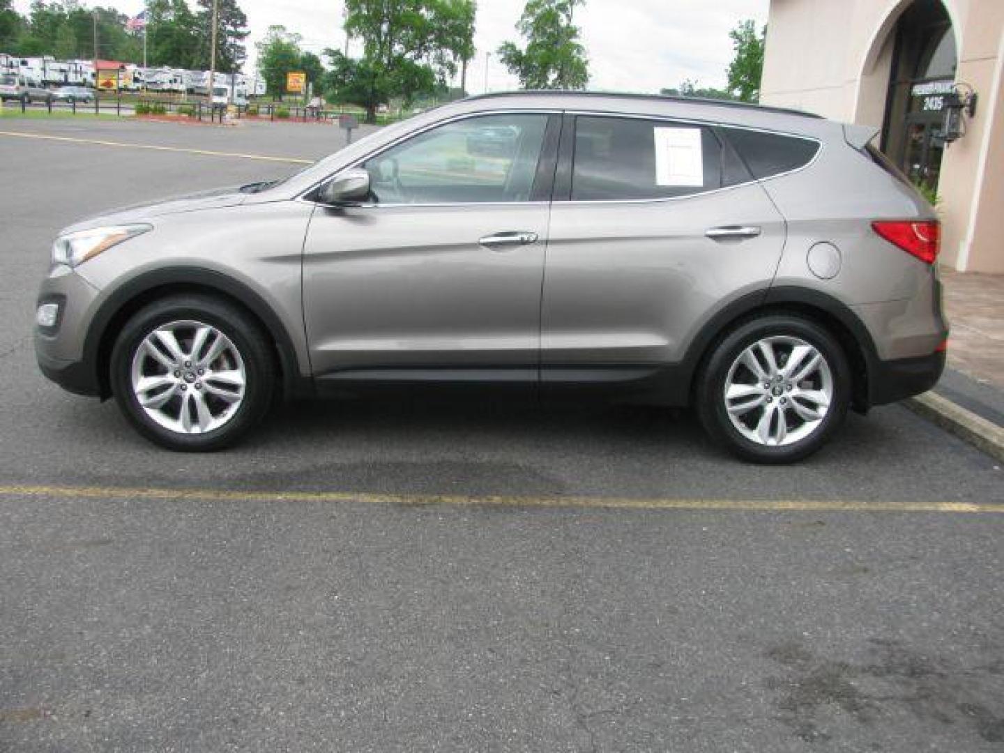 2015 Gray Hyundai Santa Fe Sport 2.0T FWD (5XYZW4LA8FG) with an 2.0L L4 DOHC 16V TURBO engine, 6-Speed Automatic transmission, located at 2443 Albert Pike, Hot Springs, AR, 71913, (501) 623-6255, 34.492222, -93.109993 - ALL LISTED FEATURES MAY NOT BE AVAILABLE!!!! - Photo#1