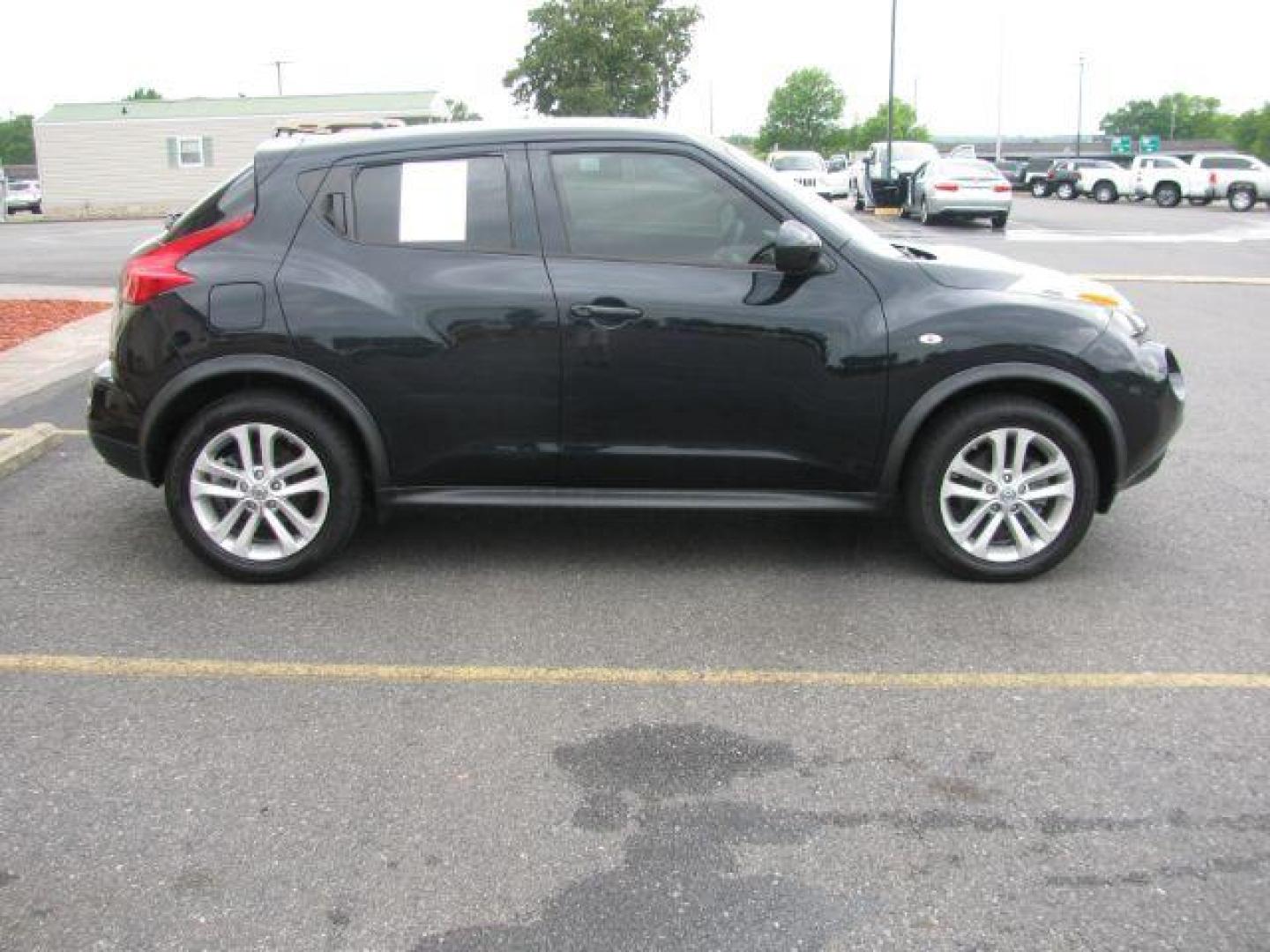 2014 Black Nissan Juke SL AWD (JN8AF5MV0ET) with an 1.6L L4 DOHC 16V engine, Continuously Variable Transmission transmission, located at 2443 Albert Pike, Hot Springs, AR, 71913, (501) 623-6255, 34.492222, -93.109993 - Photo#4