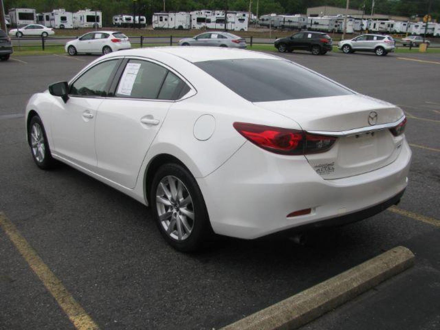 2015 White Mazda Mazda6 i Sport AT (JM1GJ1U59F1) with an 2.5L L4 DOHC 16V engine, 6-Speed Automatic transmission, located at 2443 Albert Pike, Hot Springs, AR, 71913, (501) 623-6255, 34.492222, -93.109993 - Photo#2