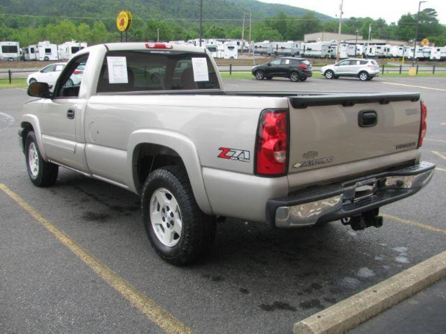 2005 Pewter Chevrolet Silverado 1500 LS Long Bed 4WD (1GCEK14T55Z) with an 5.3L V8 OHV 16V engine, located at 2443 Albert Pike, Hot Springs, AR, 71913, (501) 623-6255, 34.492222, -93.109993 - Photo#2