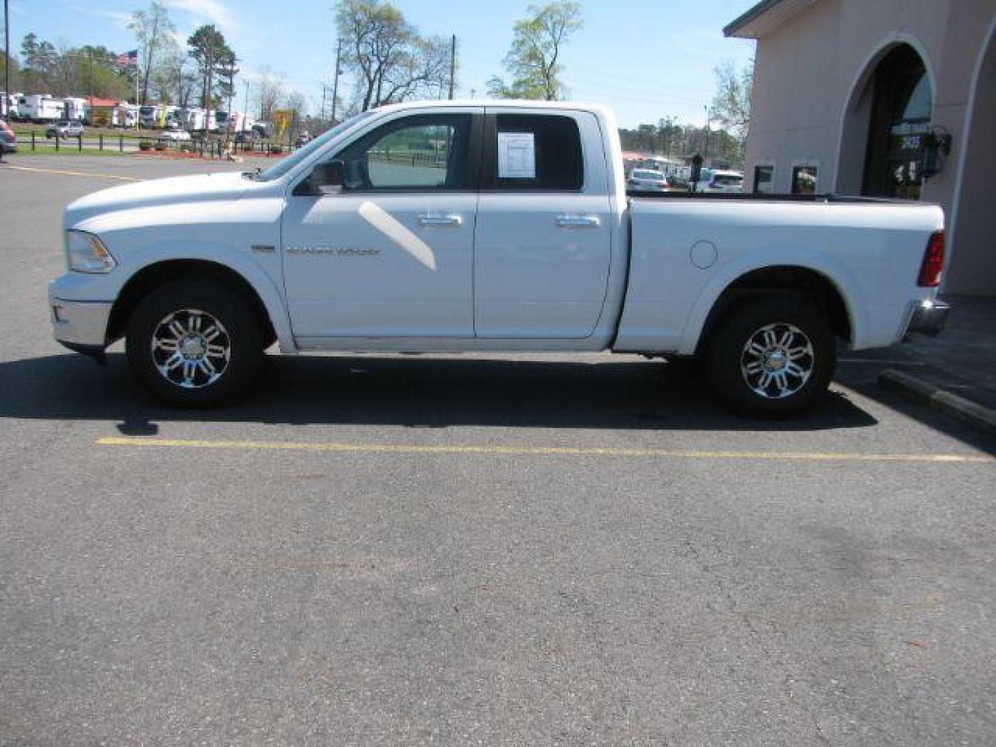 2012 White RAM 1500 SLT Quad Cab 4WD (1C6RD7GT0CS) with an 5.7L V8 OHV 16V engine, 5-Speed Automatic transmission, located at 2443 Albert Pike, Hot Springs, AR, 71913, (501) 623-6255, 34.492222, -93.109993 - ALL LISTED FEATURES MAY NOT BE AVAILABLE!!!! - Photo#1