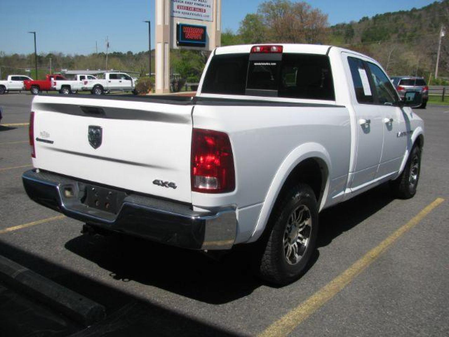 2012 White RAM 1500 SLT Quad Cab 4WD (1C6RD7GT0CS) with an 5.7L V8 OHV 16V engine, 5-Speed Automatic transmission, located at 2443 Albert Pike, Hot Springs, AR, 71913, (501) 623-6255, 34.492222, -93.109993 - ALL LISTED FEATURES MAY NOT BE AVAILABLE!!!! - Photo#4