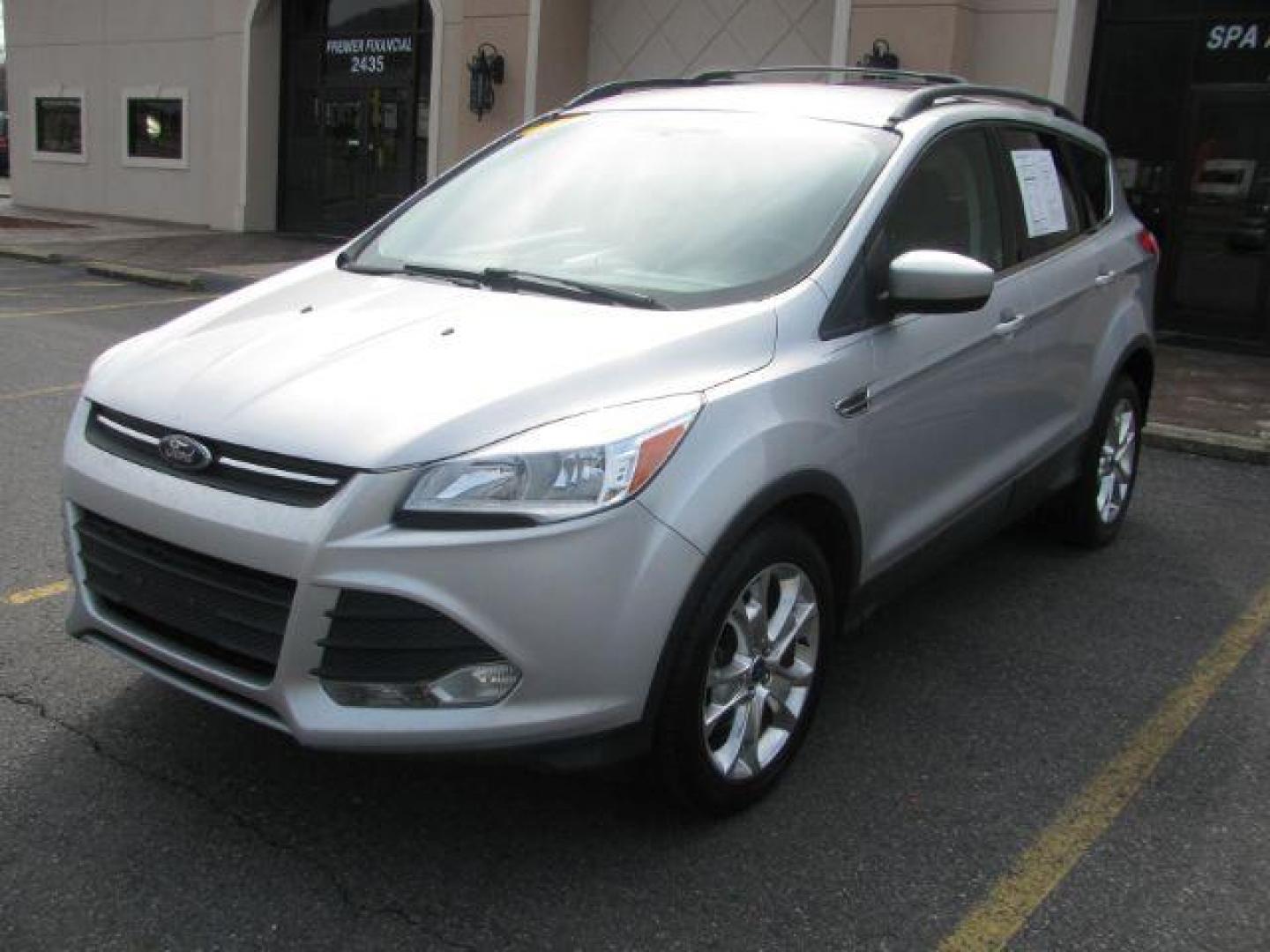 2013 Silver Ford Escape SE FWD (1FMCU0GX7DU) with an 1.6L L4 DOHC 16V engine, 6-Speed Automatic transmission, located at 2443 Albert Pike, Hot Springs, AR, 71913, (501) 623-6255, 34.492222, -93.109993 - Photo#0