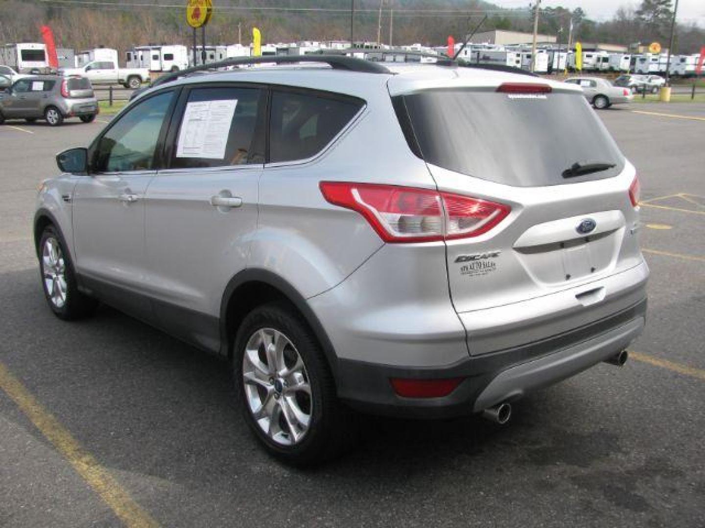 2013 Silver Ford Escape SE FWD (1FMCU0GX7DU) with an 1.6L L4 DOHC 16V engine, 6-Speed Automatic transmission, located at 2443 Albert Pike, Hot Springs, AR, 71913, (501) 623-6255, 34.492222, -93.109993 - Photo#2