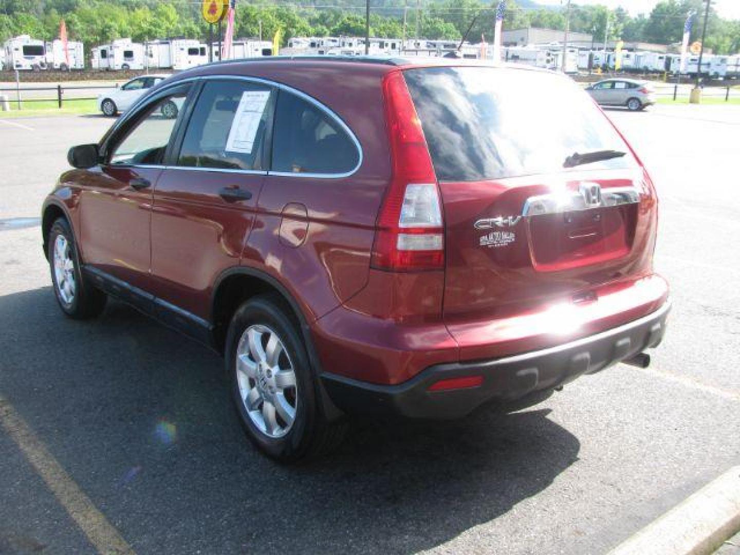 2007 Maroon Honda CR-V EX 2WD AT (JHLRE38527C) with an 2.4L L4 DOHC 16V engine, 5-Speed Automatic transmission, located at 2443 Albert Pike, Hot Springs, AR, 71913, (501) 623-6255, 34.492222, -93.109993 - Photo#3