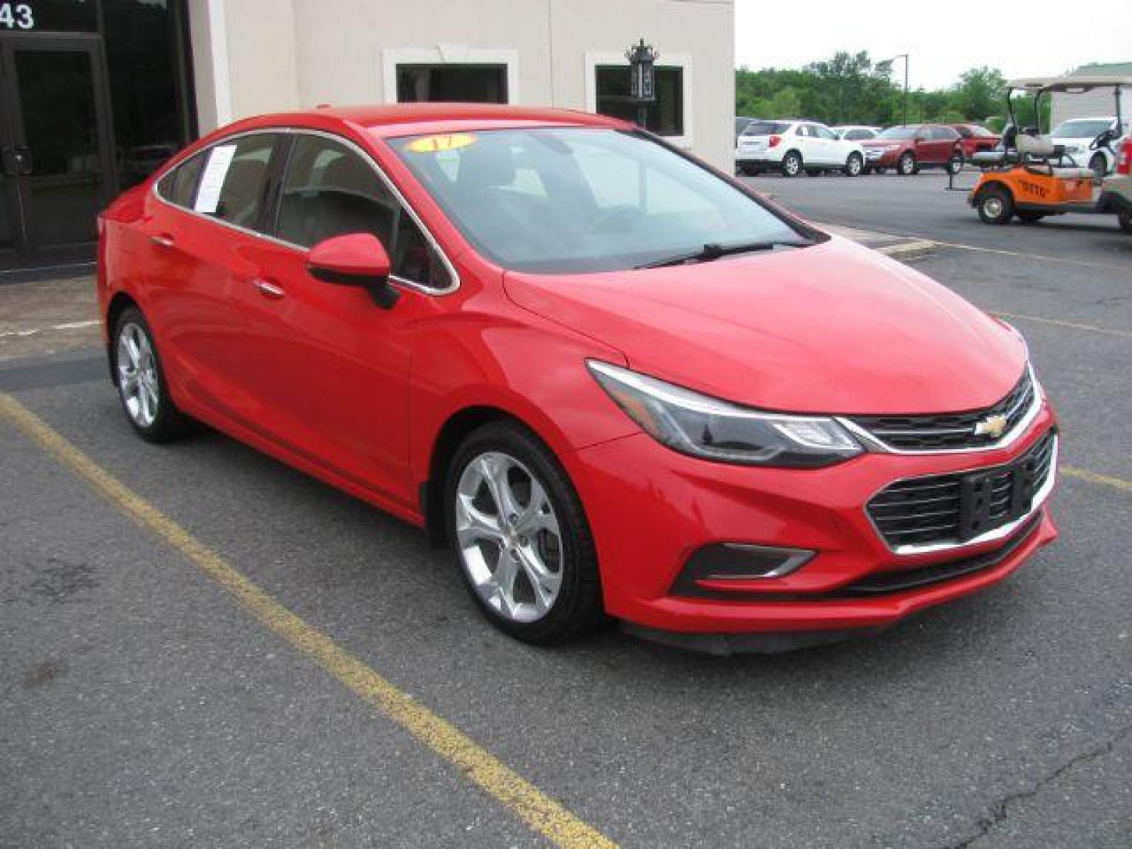 2017 Red Chevrolet Cruze Premier Auto (1G1BF5SM9H7) with an 1.4L L4 DOHC 16V TURBO engine, 6-Speed Automatic transmission, located at 2443 Albert Pike, Hot Springs, AR, 71913, (501) 623-6255, 34.492222, -93.109993 - Photo #5