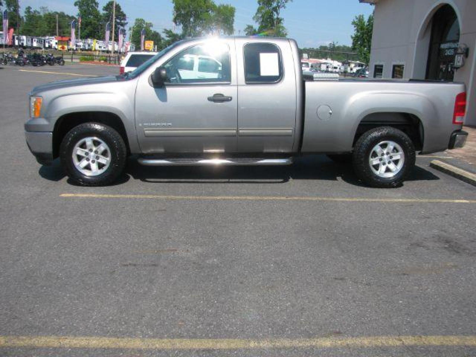 2009 Gray GMC Sierra 1500 SLE1 Ext. Cab Std. Box 2WD (1GTEC29J99Z) with an 5.3L V8 OHV 16V engine, 6-Speed Automatic transmission, located at 2443 Albert Pike, Hot Springs, AR, 71913, (501) 623-6255, 34.492222, -93.109993 - Photo #1