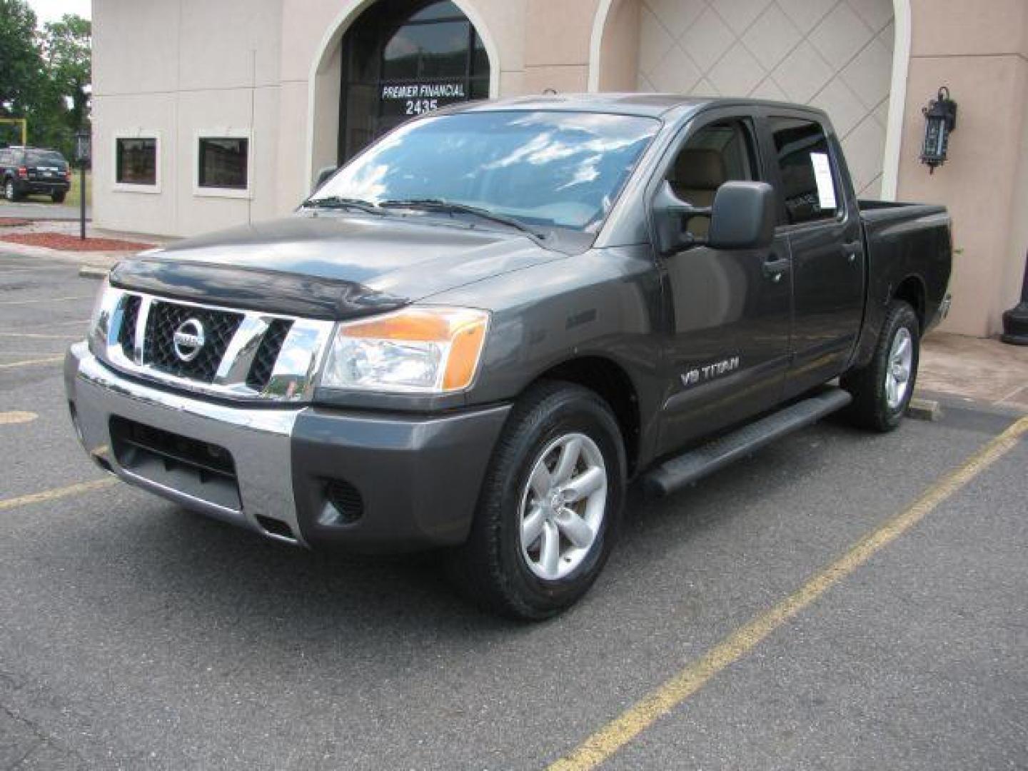 2008 Gray Nissan Titan SE Crew Cab 2WD SWB (1N6BA07D68N) with an 5.6L V8 DOHC 32V FFV engine, 5-Speed Automatic transmission, located at 2443 Albert Pike, Hot Springs, AR, 71913, (501) 623-6255, 34.492222, -93.109993 - Photo#0