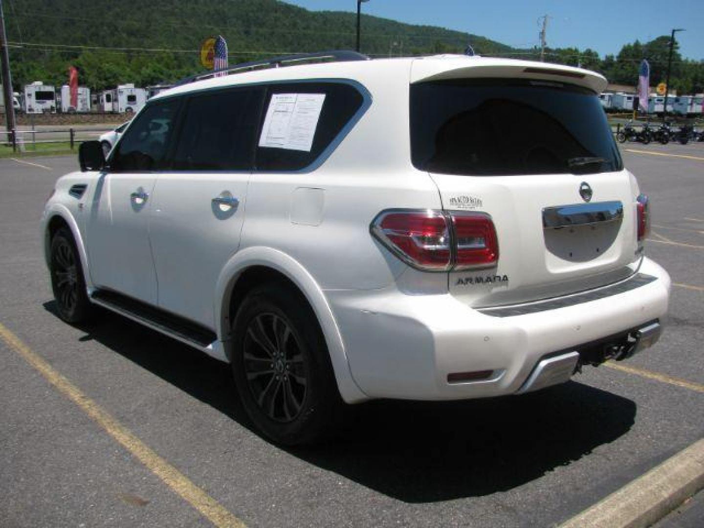 2018 White Nissan Armada Platinum AWD (JN8AY2NC5JX) with an 5.6L V8 DOHC 32V engine, 7-Speed Automatic transmission, located at 2443 Albert Pike, Hot Springs, AR, 71913, (501) 623-6255, 34.492222, -93.109993 - Photo#2