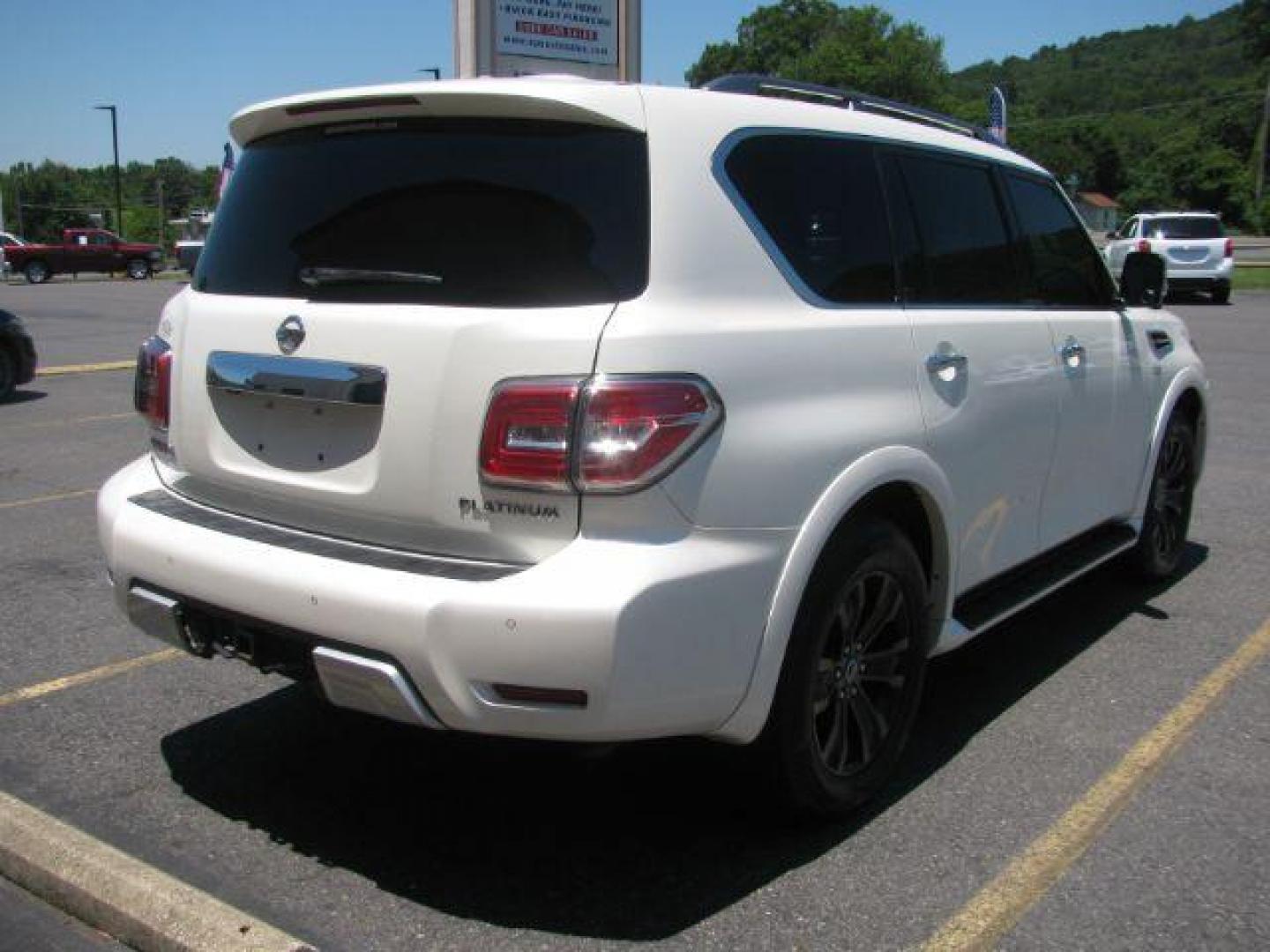 2018 White Nissan Armada Platinum AWD (JN8AY2NC5JX) with an 5.6L V8 DOHC 32V engine, 7-Speed Automatic transmission, located at 2443 Albert Pike, Hot Springs, AR, 71913, (501) 623-6255, 34.492222, -93.109993 - Photo#3