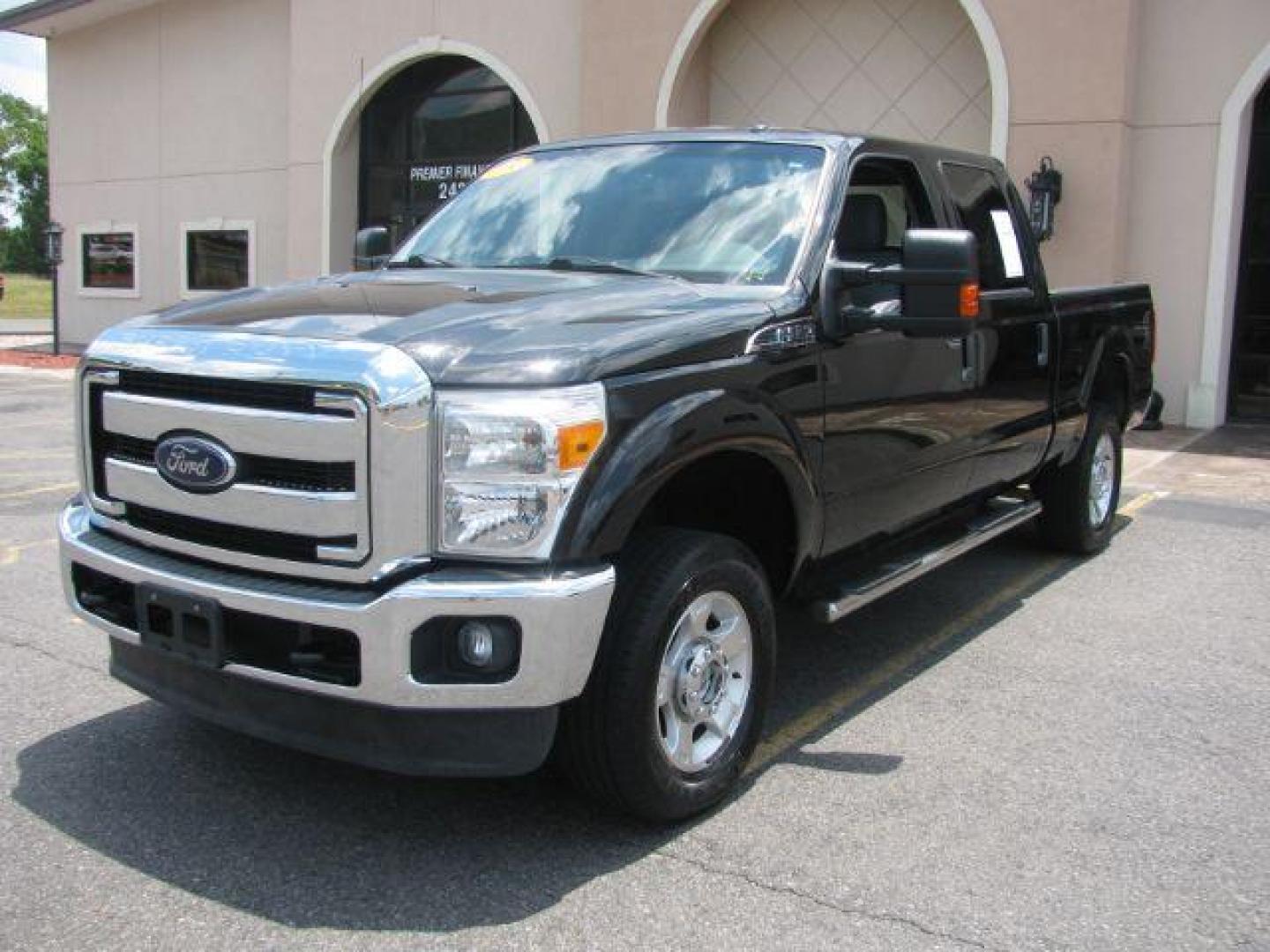 2015 Black Ford F-250 SD XLT Crew Cab 4WD (1FT7W2B66FE) with an 6.2L V8 OHV 16V engine, 6-Speed Automatic transmission, located at 2443 Albert Pike, Hot Springs, AR, 71913, (501) 623-6255, 34.492222, -93.109993 - Photo#0