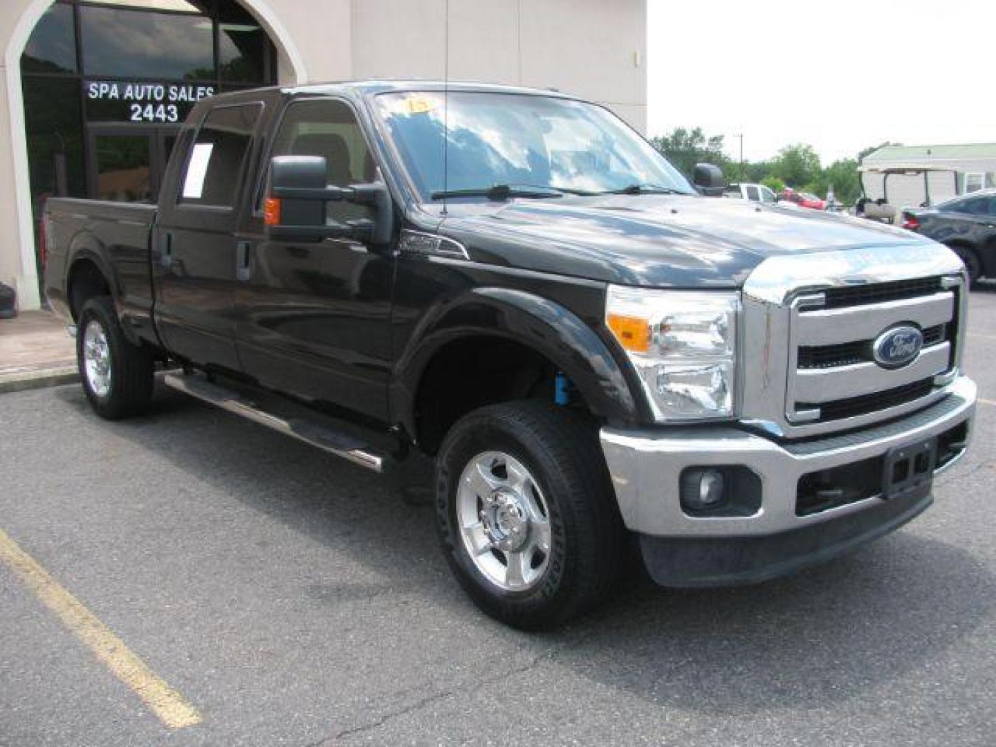 2015 Black Ford F-250 SD XLT Crew Cab 4WD (1FT7W2B66FE) with an 6.2L V8 OHV 16V engine, 6-Speed Automatic transmission, located at 2443 Albert Pike, Hot Springs, AR, 71913, (501) 623-6255, 34.492222, -93.109993 - Photo#6