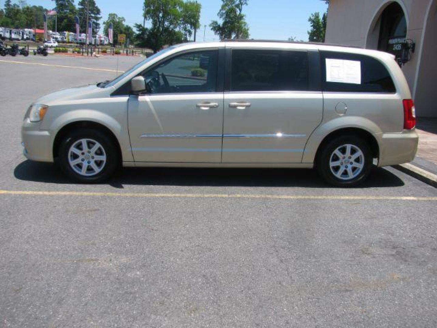 2011 Gold Chrysler Town and Country Touring (2A4RR5DG0BR) with an 3.6L V6 DOHC 24V engine, 6-Speed Automatic transmission, located at 2443 Albert Pike, Hot Springs, AR, 71913, (501) 623-6255, 34.492222, -93.109993 - Photo#1