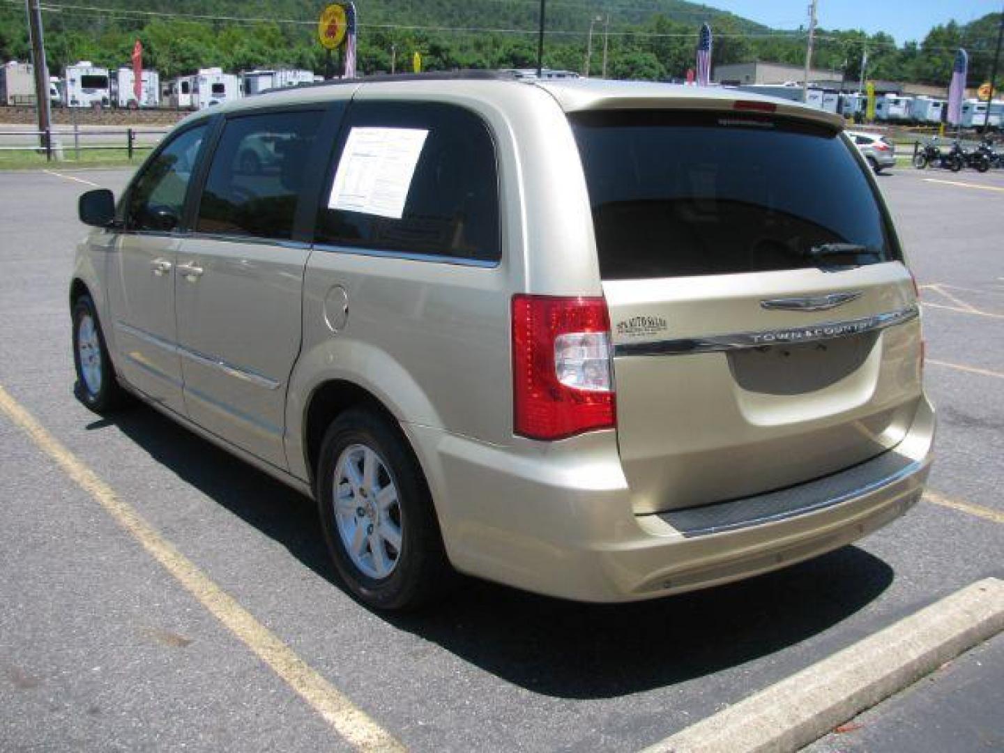 2011 Gold Chrysler Town and Country Touring (2A4RR5DG0BR) with an 3.6L V6 DOHC 24V engine, 6-Speed Automatic transmission, located at 2443 Albert Pike, Hot Springs, AR, 71913, (501) 623-6255, 34.492222, -93.109993 - Photo#2